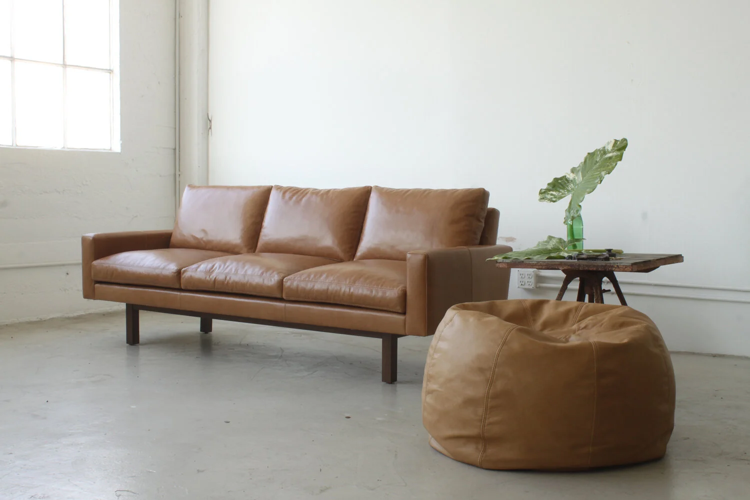 Michael_Felix_Standard_Sofa_and_Pouf.jpg