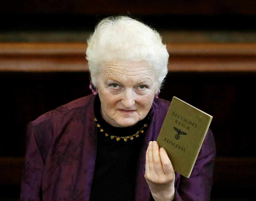 Julia Neuberger with her grandmother's J-stamped passport ( Photo: Reuters)