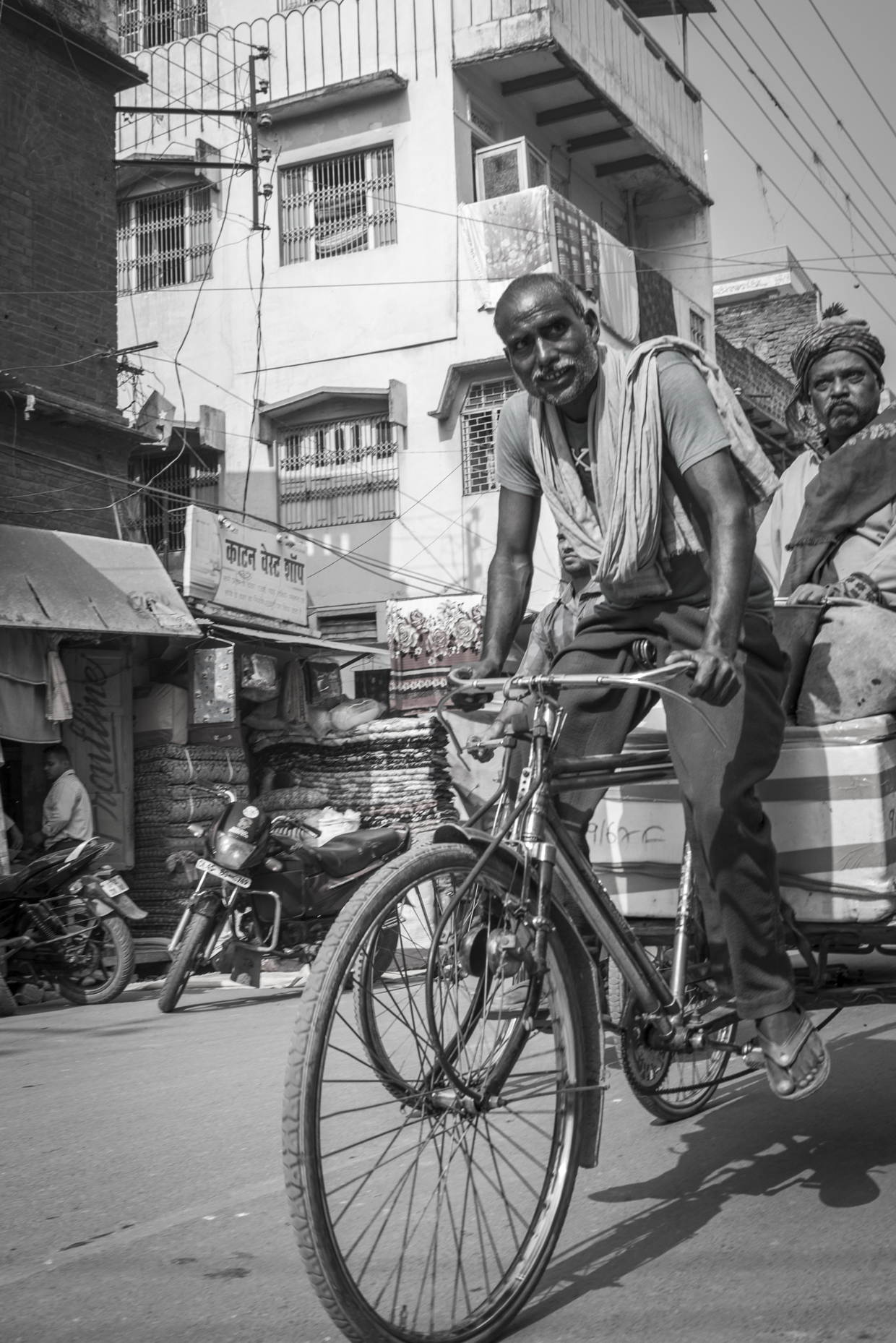 An Indian man trying to make a living. 