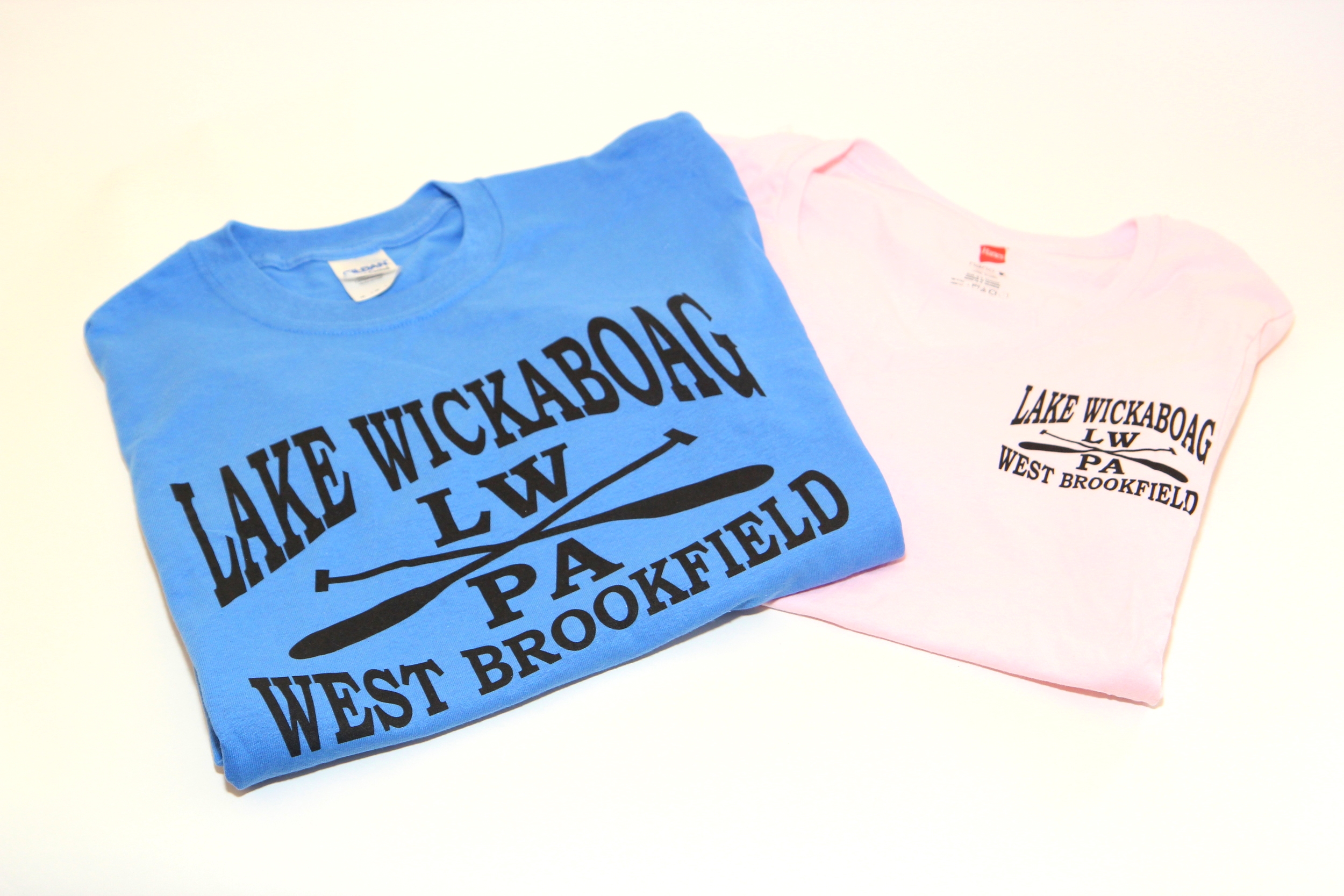 New Logo Tee shirts in soft pink and blue $15 - $20