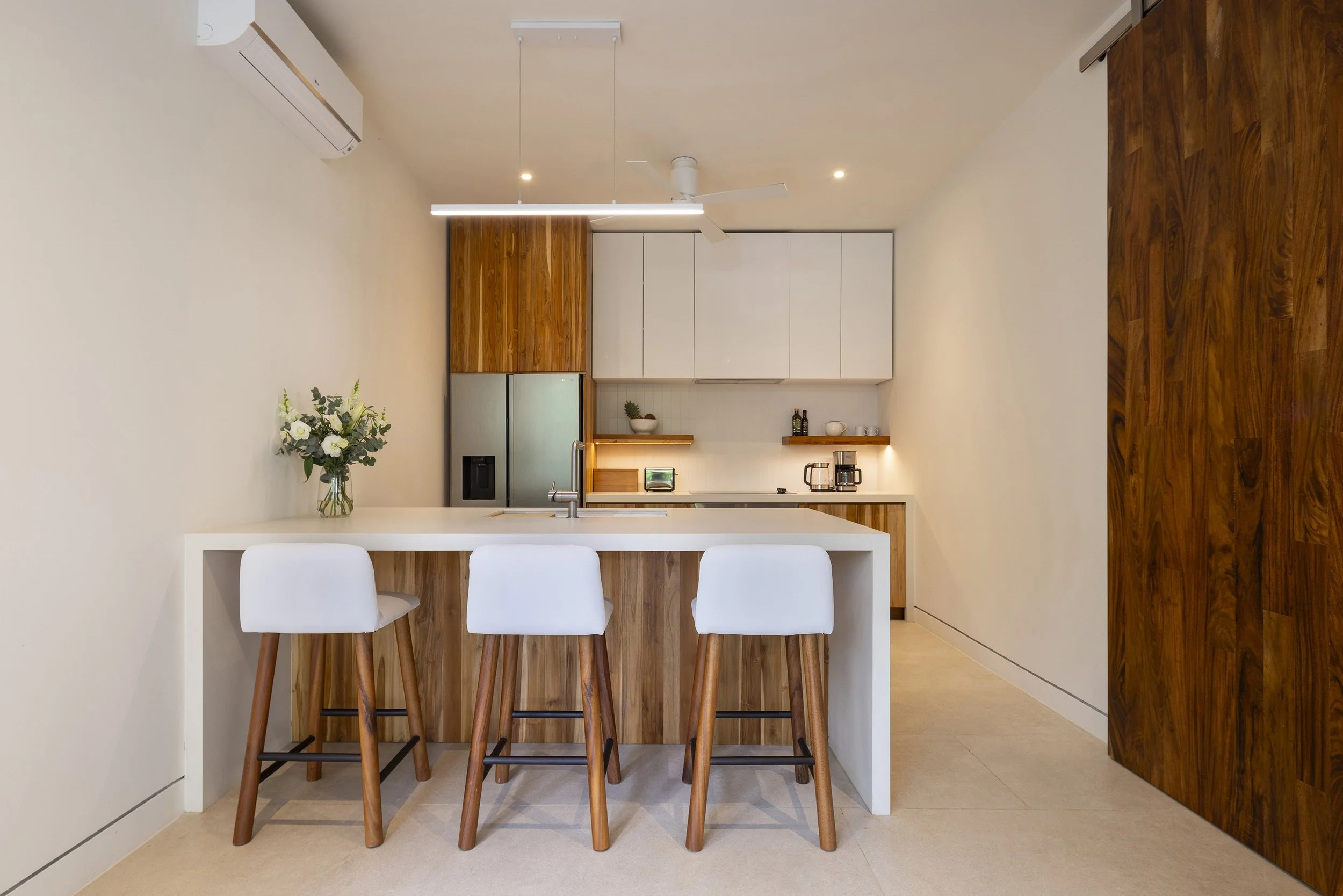 Haven-Nosara-Vacation-Rental-Luxury-Villa-Kitchen-Seating-Suelo.jpg