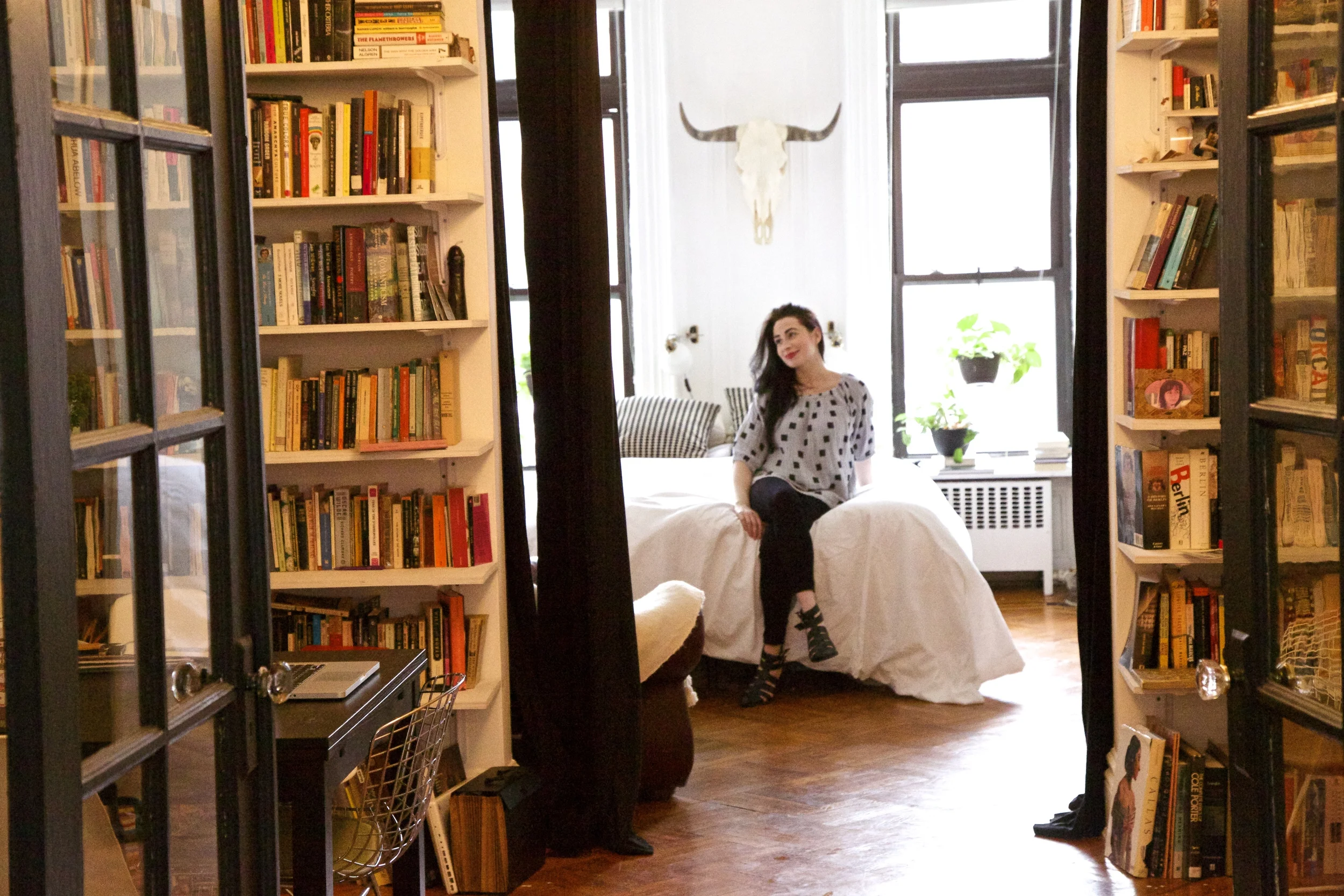 Messy books (we've still got lots of projects to work on in the house) but there's sunlight and plants so I'm smiling.
