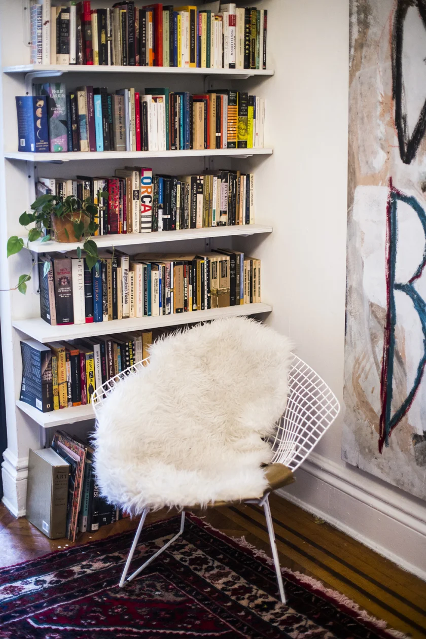 Bertoia Diamond wire chair , vintage. Similar here . On the right you can just see a painting by Dan Ivic
