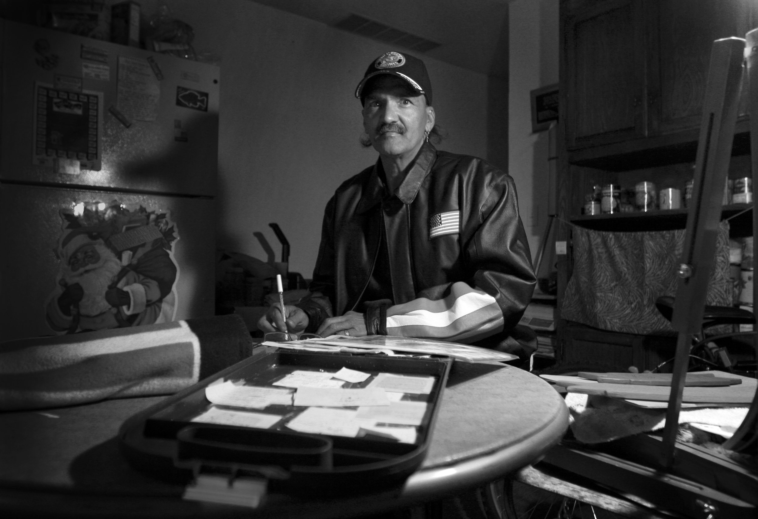 Eugene Morris drawing out a sketch for a painting while living at the Homeless Veterans Fellowship (2007).