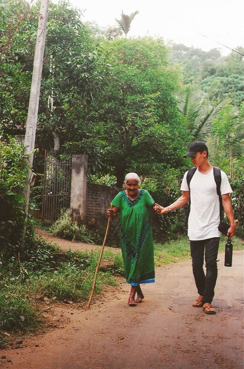 "Go away!" she chuckled in Sinhala, one of Sri Lanka's main languages, to some of the younger village boys who were following us to the interview. "I'm going with this nice boy to America."