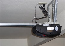 A typical garage door opener... the gear in question is on the top