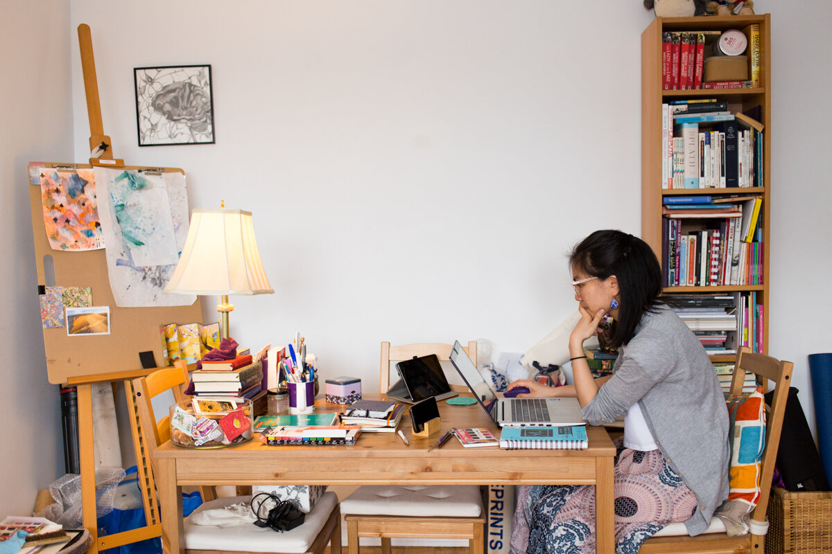 Visual artist Nicole Lee prepares for a meeting with her career coach in her home studio in Montréal, Canada.