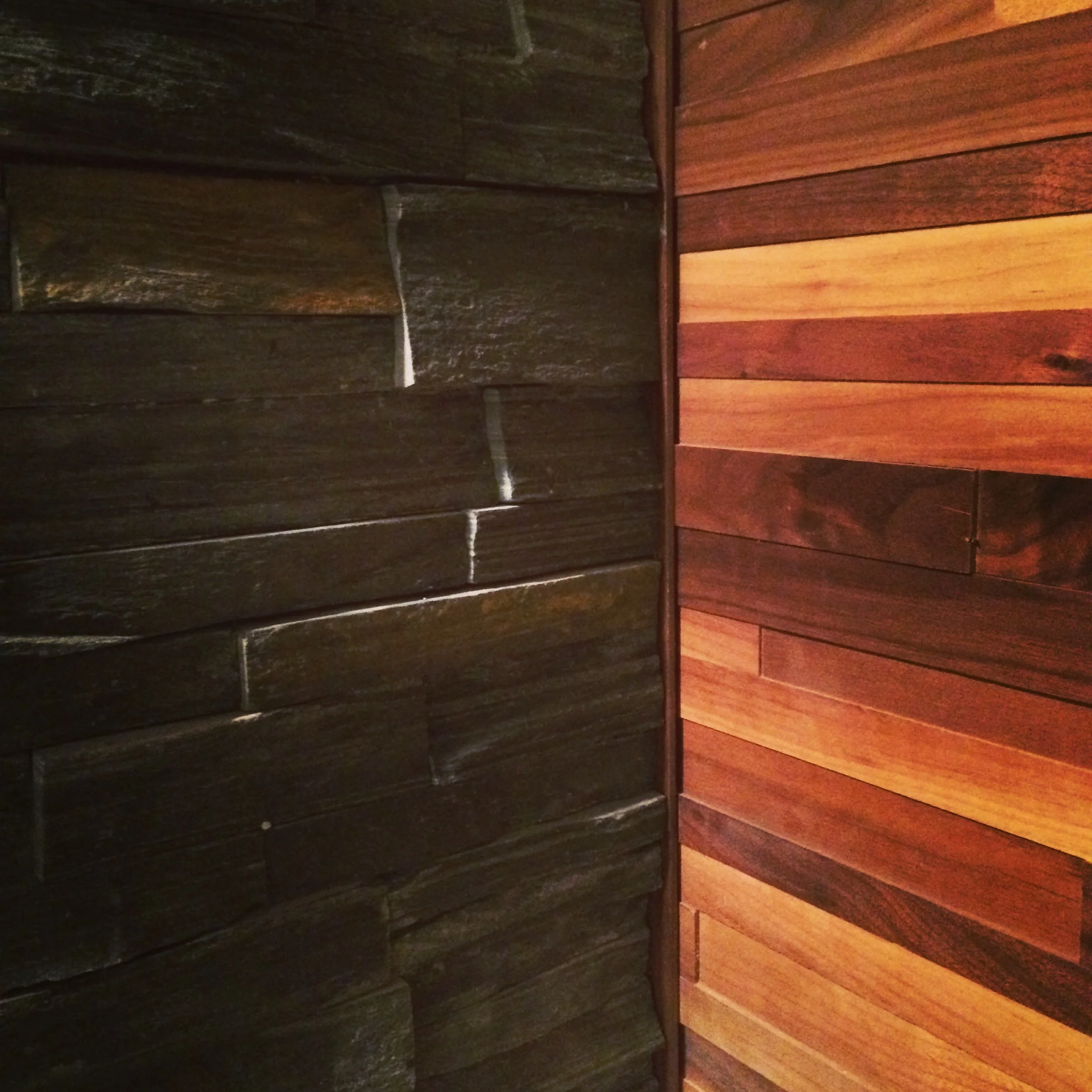Basement renovation Saskatoon, stone work, wood panelling, custom, trusted contractor