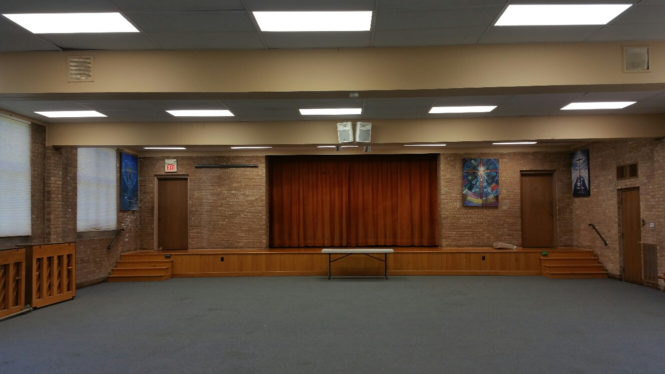 Fellowship Hall-view looking at center stage from center of room.jpg