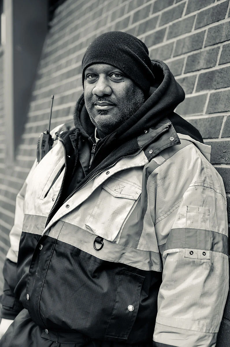 52/365 - While I was out walking around Baltimore City during my internship I ran across this kind gentleman and his co-worker. Their work van had broken down on the side out in front of the Baltimore Sun building. He was kind enough to let me photograph him while he waited for help to come by!