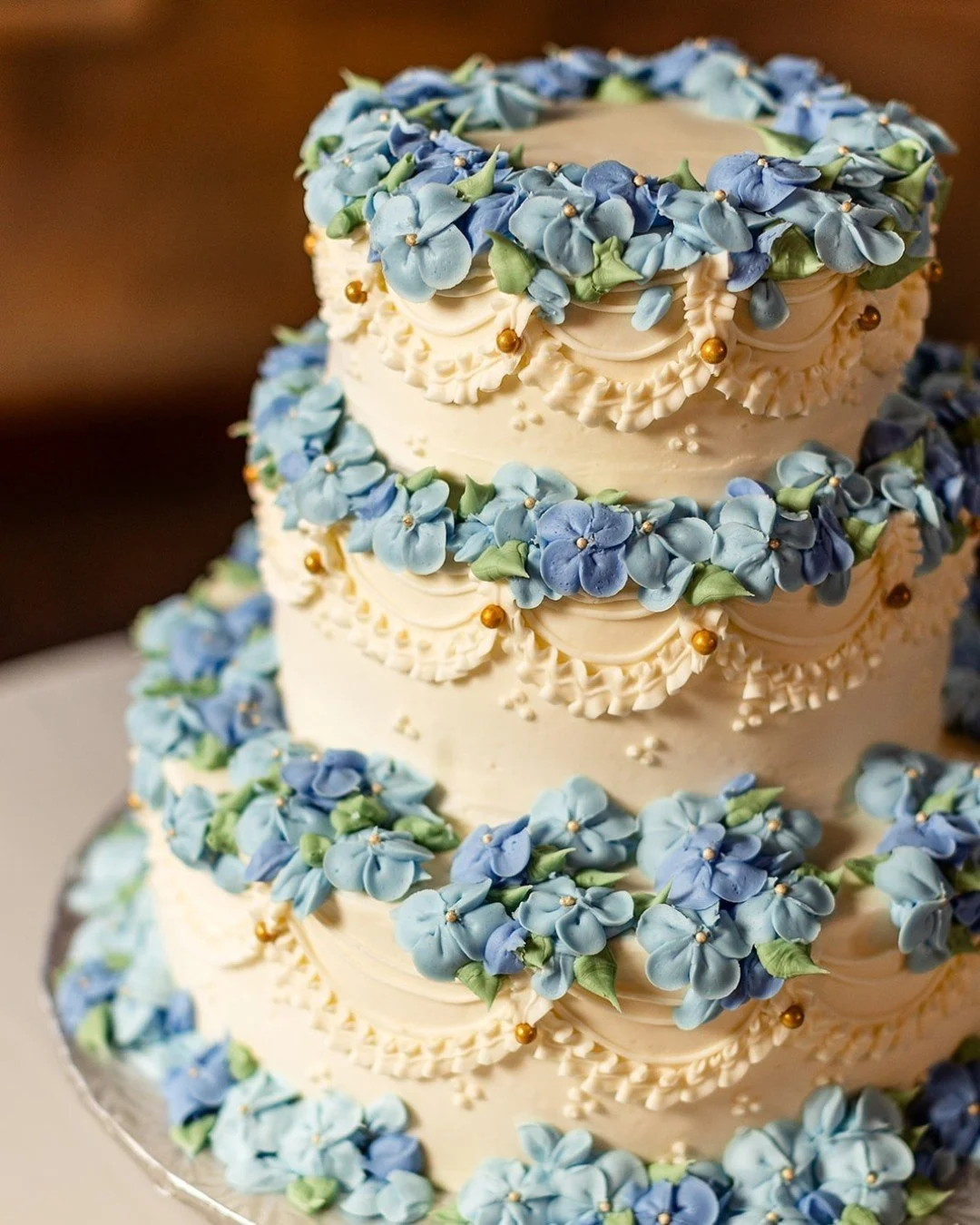 Graul's Market knocked it out of the park with Colleen &amp; Nick's wedding cake! I love the hydrangeas; they were so realistic.

#weddingcake #marylandweddingphotographer #carrollcountyphotographer #weddingcakeinspiration