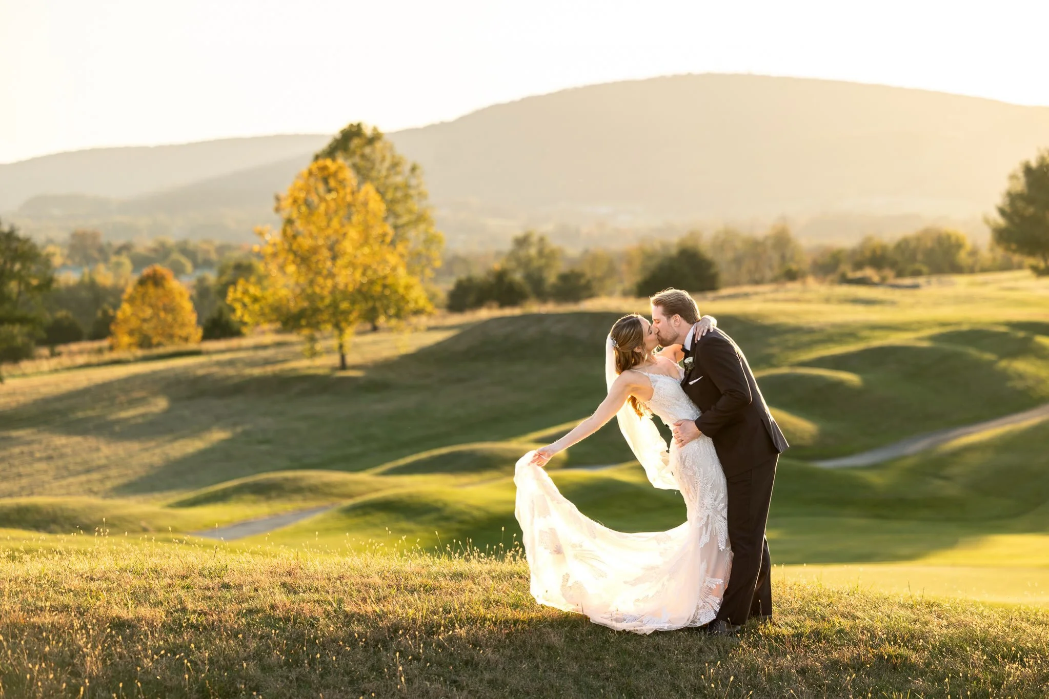 Highlights from Kacy &amp; Joe&rsquo;s wedding are here! They had an iconic fall wedding at @catoctinhallatmusketridge 💕👏

@wizerproductions 
@blossomandbasketboutique 
@sagecakery 
@michaelamadebeauty 
@elliesbridal 
@azazieofficial 
@generationtu