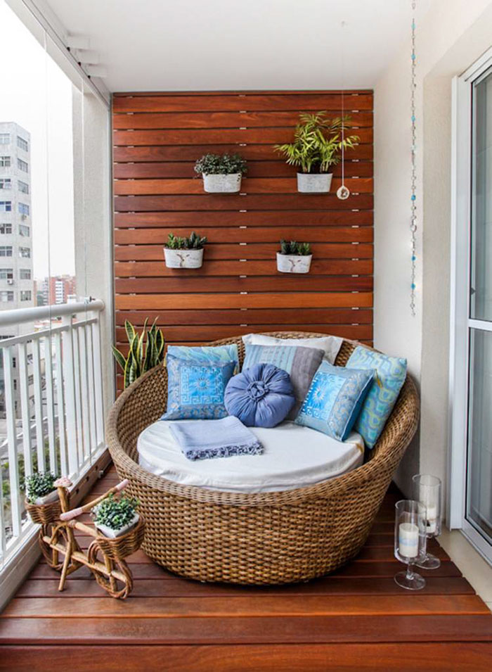 Snuggle up with your cat and take a little snooze. The wood-paneling is impressive in this picture -- besides what's pictured, not much else is needed on the patio (besides you, if you have a chair of this size).