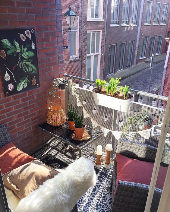 This little hideaway is a cute little spot for an escape from being inside all day without having to be too far from home. Loving the faux-fur draped over the couch, and the greenery surrounding the space (including the painting on the wall!). Lace flags and Edison bulbs decorating the railing makes this spot more ~yours~ and the pillows and floor rug make this a cozy spot in cooler summer nights (because we all know the days drift away). You could recreate this look using items from West Elm, Target, and even DIY if you have the time (and need some me-time on top of that). 