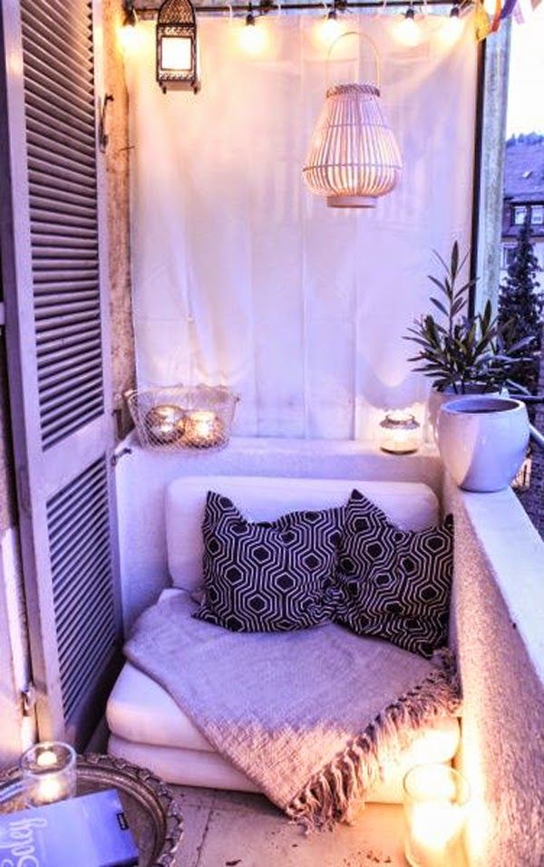 Some people might move into a new place and find they don't know what to do with the even tinier balcony or backyard space that came with their new digs. Well here it is! There's just enough room for a side table, small rug, and a cushion-y, comfy couch to tuck in on one side. If you choose to go with this route, invest in some plastic coverings of some sort to protect it from bad weather. Whether the sun's out or it's an overcast day, this is a snuggly spot for a glass of wine (or cup of coffee, depending on the time of day) and your favorite book. Gosh, we just want to curl up right now. 
