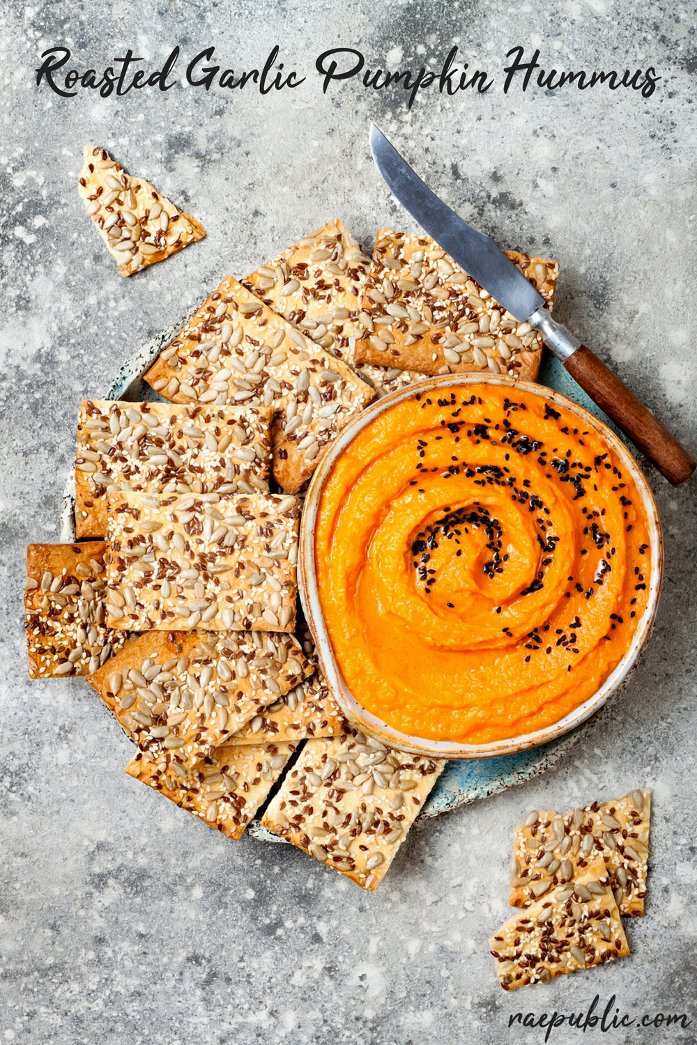 Roasted Garlic Vegan Pumpkin Hummus that tastes so divine! This plant-based hummus is so easy to make, it will make the perfect addition to your wintery snack list. 