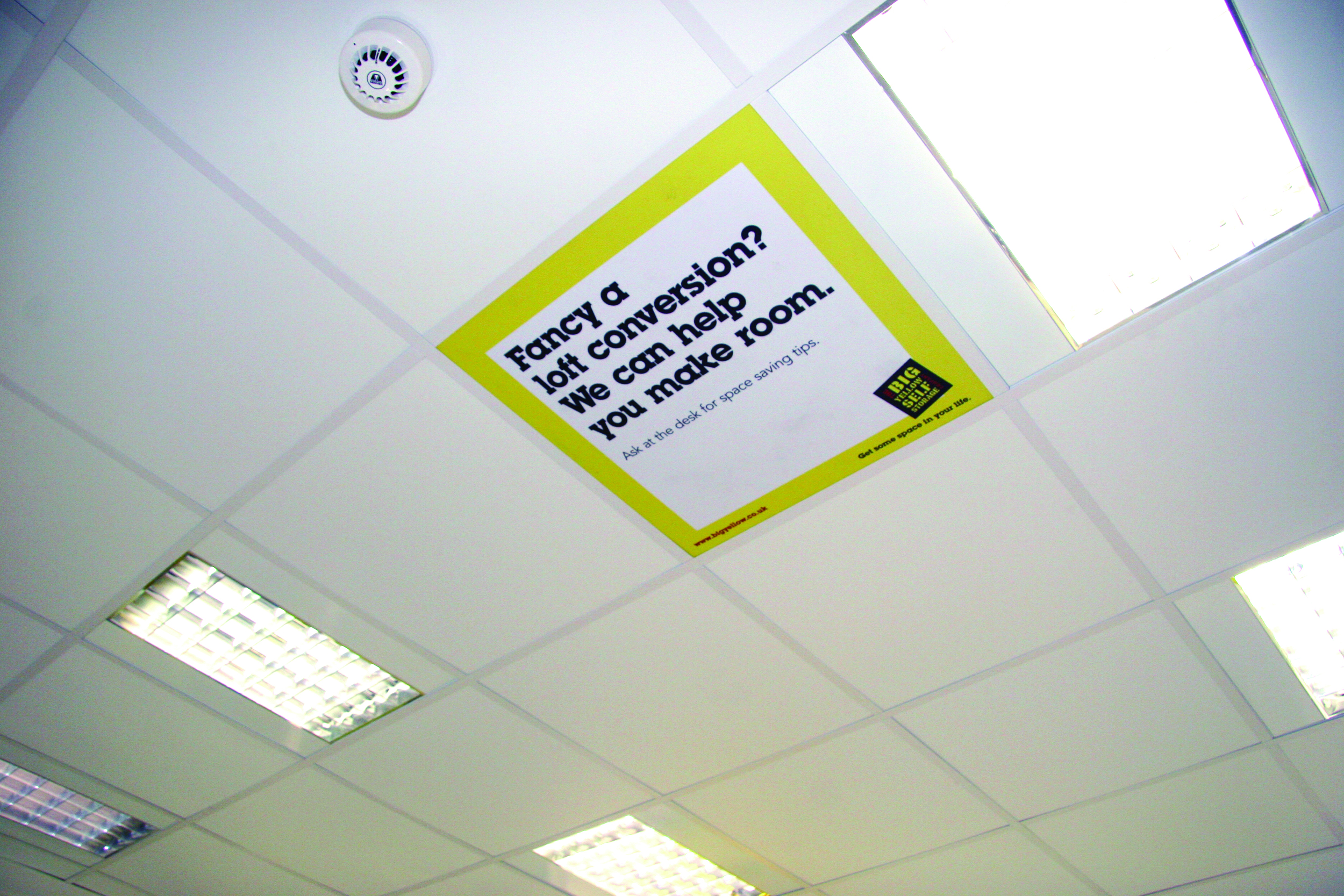 On ceiling tile in reception 