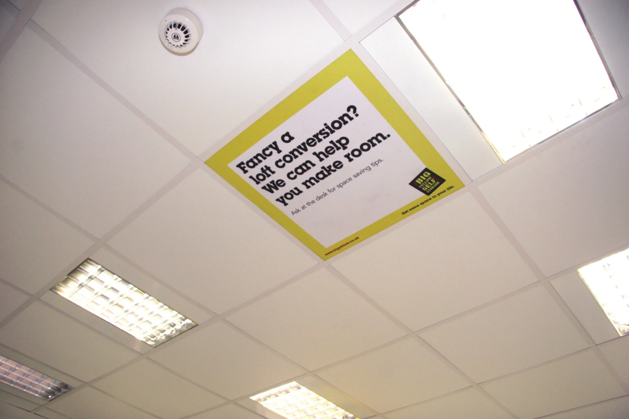 On ceiling tile in reception 