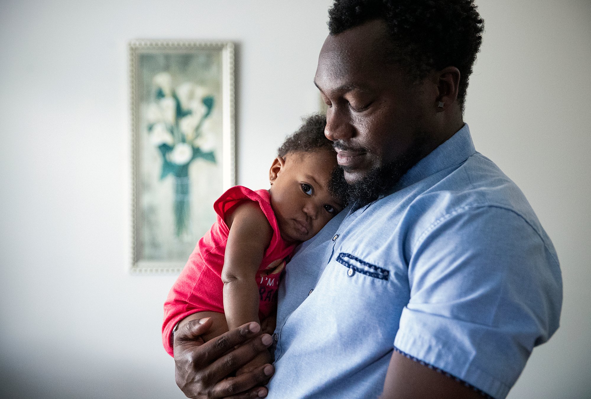  Anthony Wallace holds his daughter Charlotte, pictured at 10 months old, at his Indianapolis home on Thursday, Aug. 19, 2021. Anthony's wife Chaniece died from complications of preeclampsia a few days after giving birth to Charlotte by emergency c-s