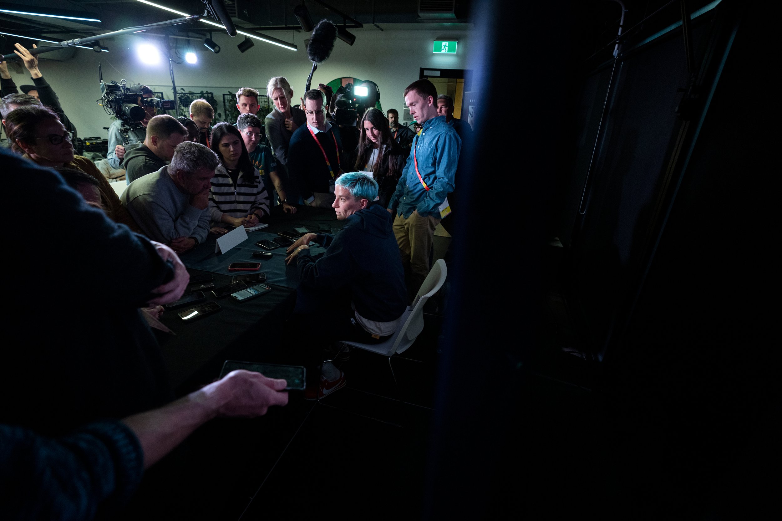  United States forward Megan Rapinoe (15) is surrounded by journalists as she answers questions during a U.S. soccer press conference July 30, 2023, amid the 2023 FIFA Women's World Cup in Auckland.  