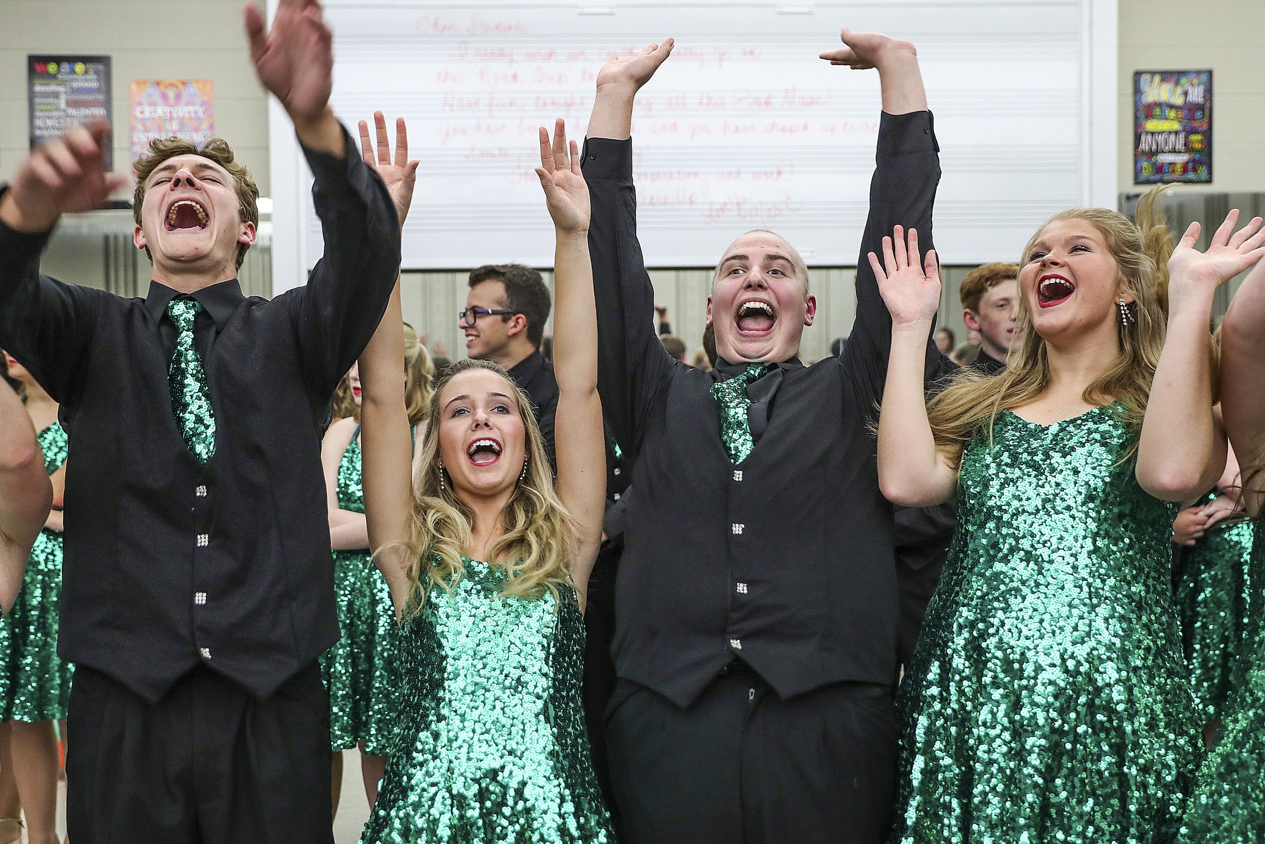  Second from right, Austin Hewitt and other senior students throw their hands in the air after circling for a pep chant and prayer before Eastern High School's fall show choir concert in Greentown, Ind., Wednesday, Sept. 26, 2018. In June 2017, Hewit