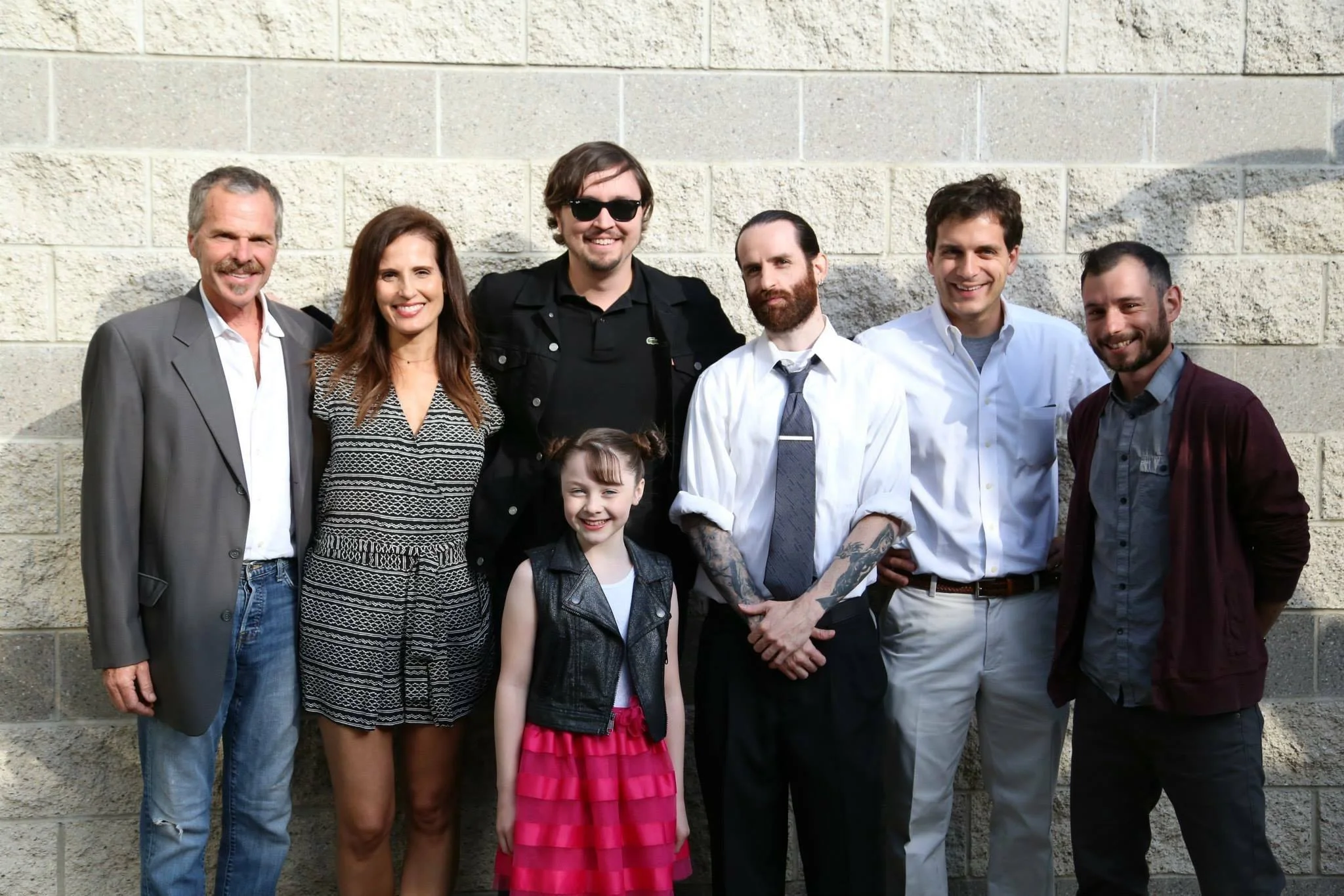 Christiano Dias and team accept several awards for Monster in a House at LAIFFA. (From Left: Joseph Bottoms, Lisa Roumain, Kitana Turnbull, Christiano Dias, Bret Newton, Michael Helenek, and Alex Grossfeld).