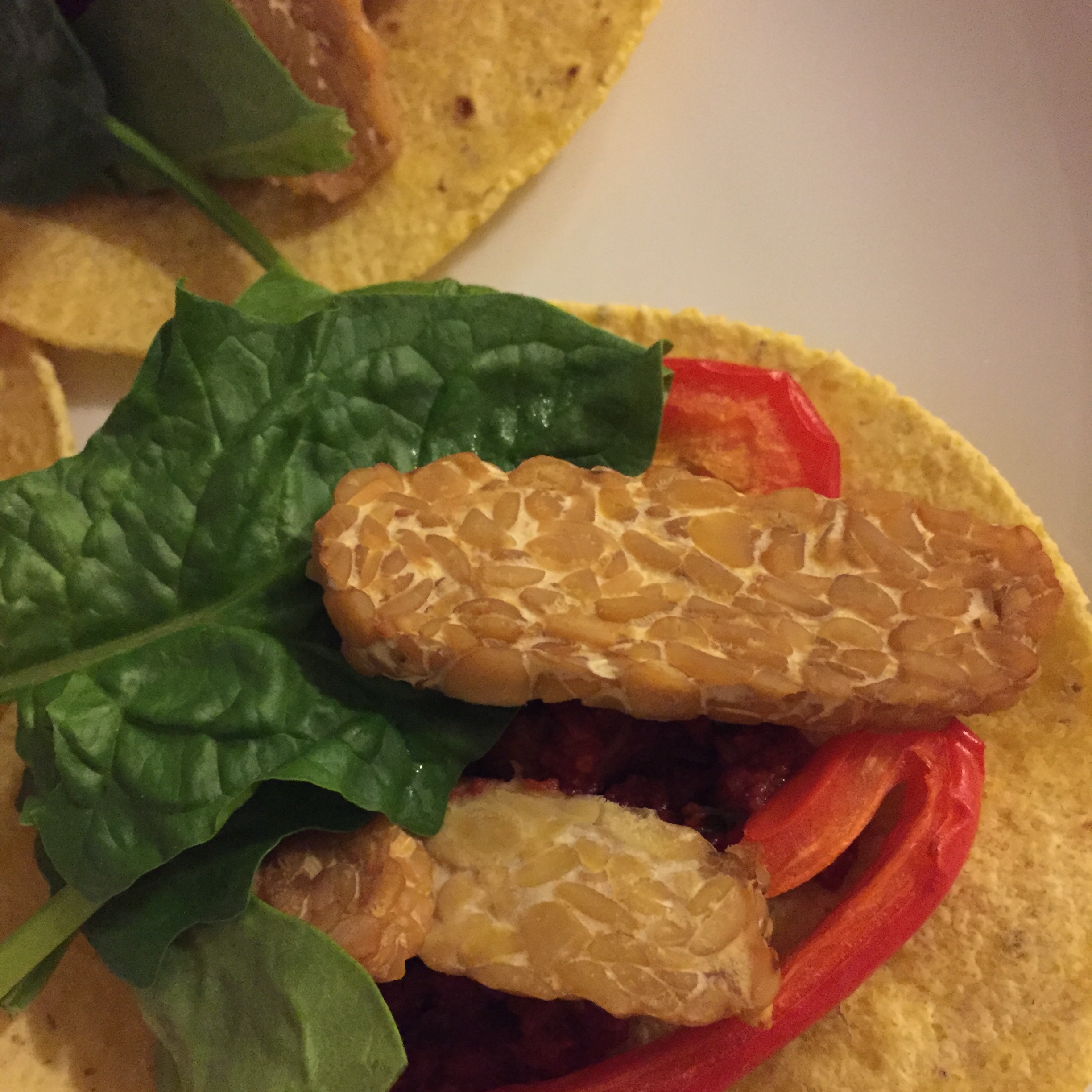 Tempeh is a plant-based food made of fermented soy beans that is packed with protein. Spinach is a great source of protein too.