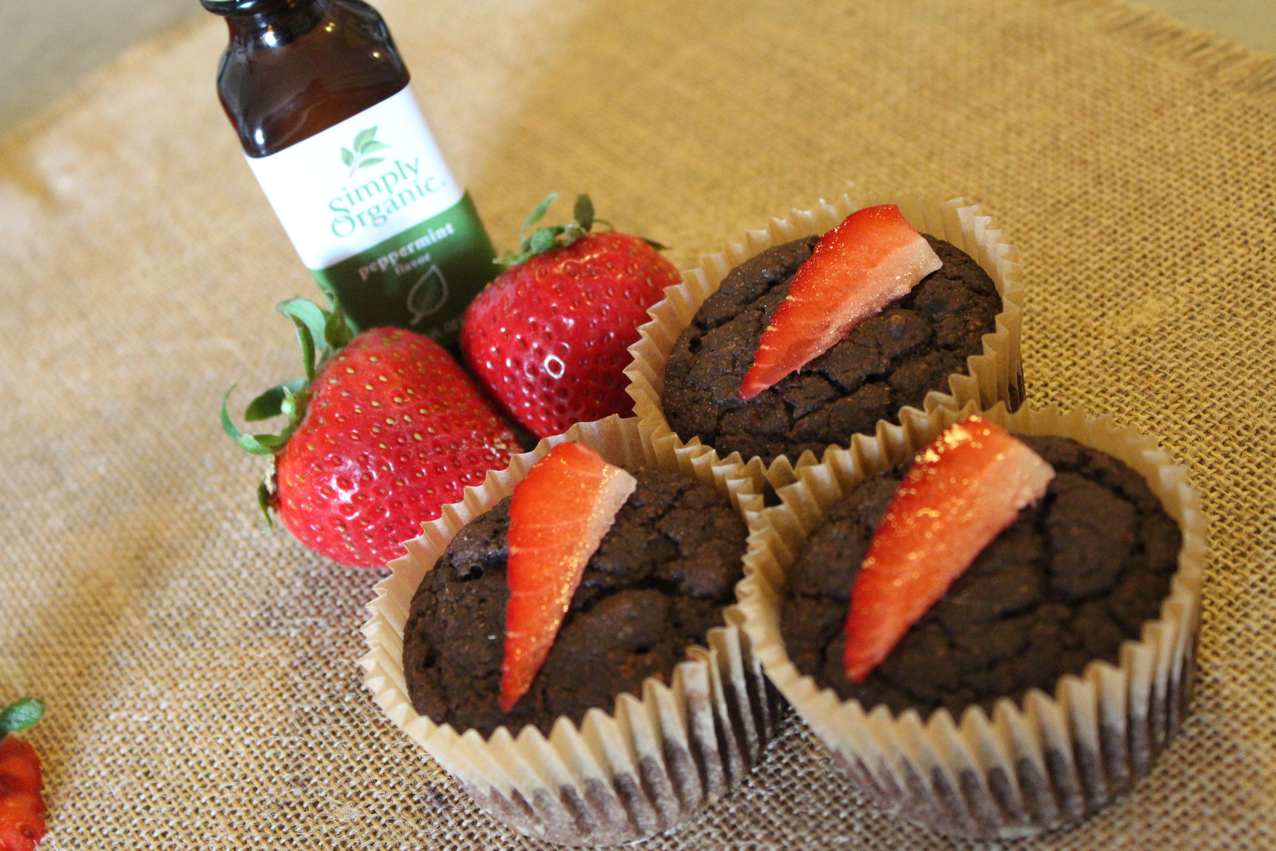 We made cupcakes, too, that are even better for sharing. No icing, no problem. We topped with strawberry quarters and 2 drops of organic peppermint oil.