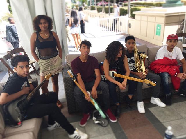 Catching some shade in Downtown Oakland waiting to perform for the Back to School Rally #music #backtoschool #education #bass #drums #guitar #piano #singing #thejammingnachos