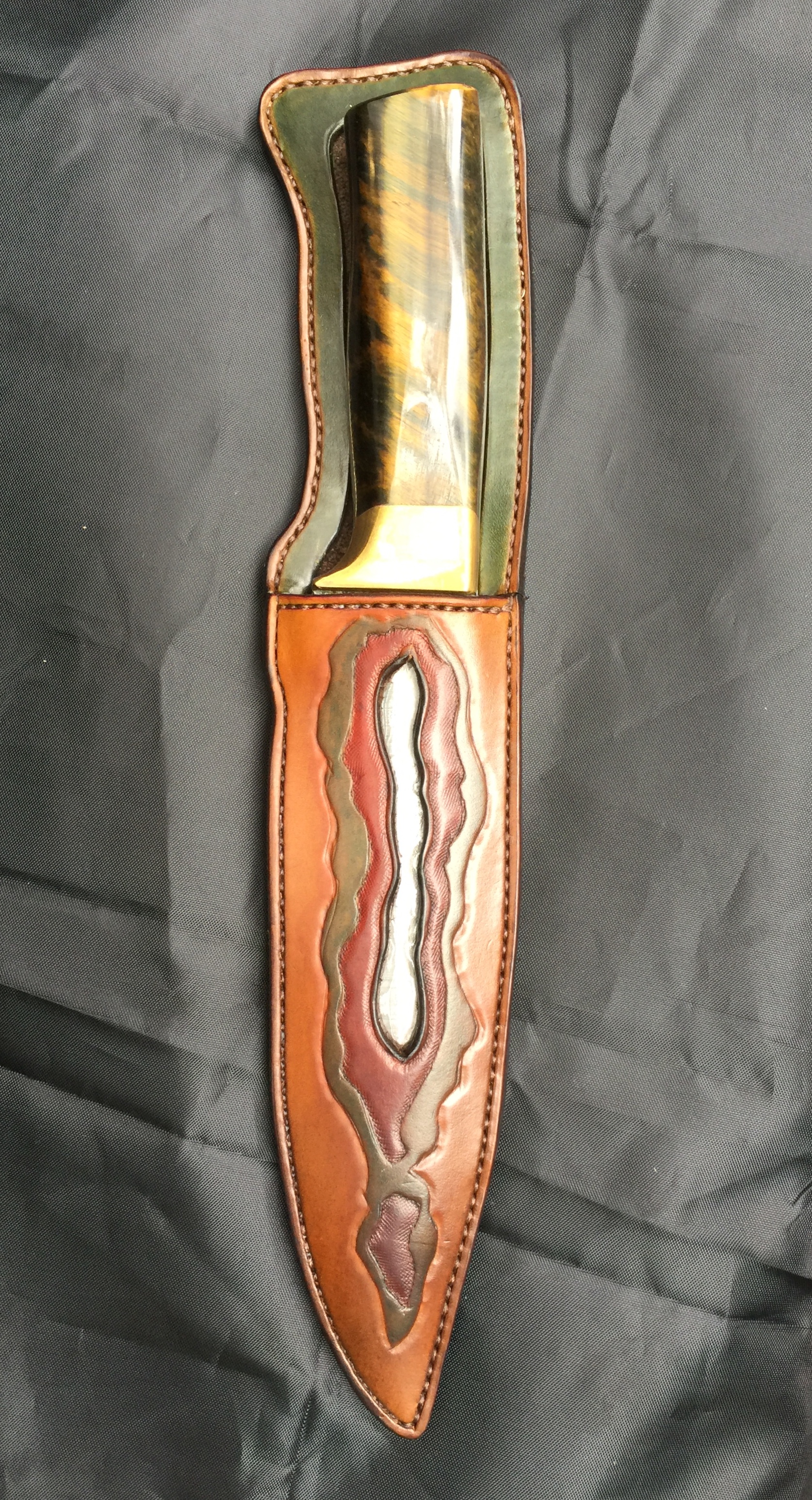 Fun with a knife sheath made to match this beautifully handmade knife by a local craftsman