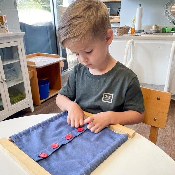 Why We Practice Fine Motor Skills early in Montessori -

In a Montessori classroom, writing starts long before a child ever picks up a pencil!

From squeezing tongs and pouring water to working with the Knobbed Cylinders, every activity in our Practi
