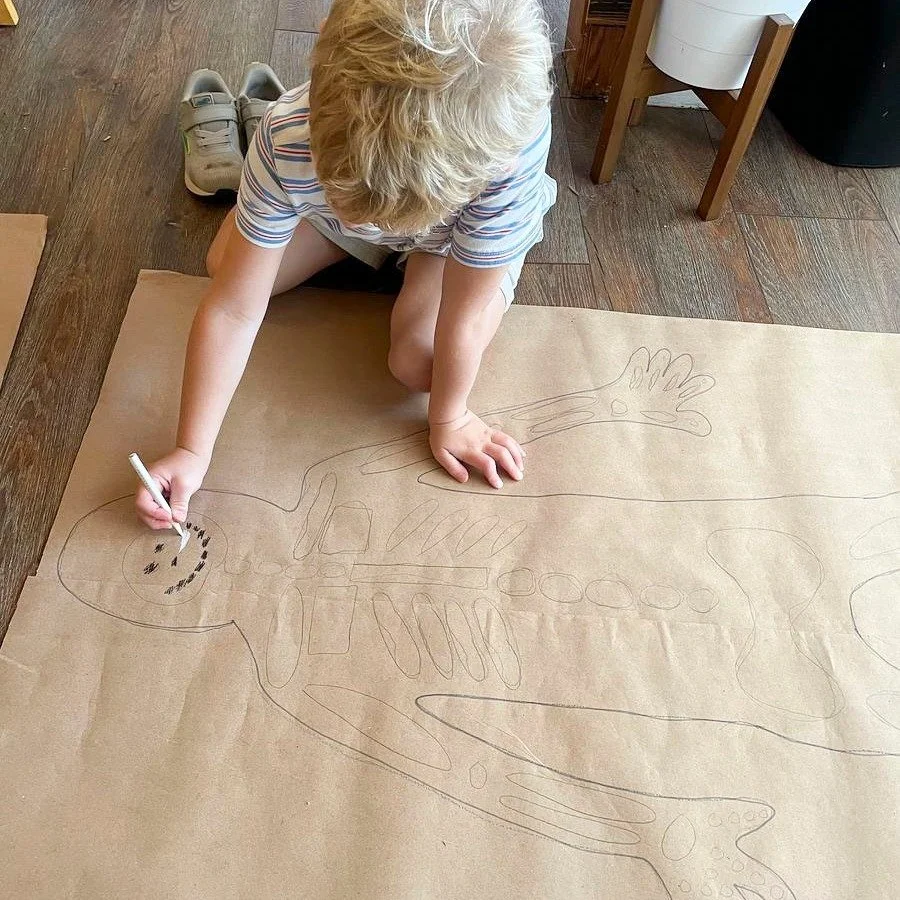 No body had more fun than our Magnolia Afternoon Primary students!  They got into the spooky season spirit by tracing each other to make life-sized skeletons and learning the names &amp; location of their bones. 🦴