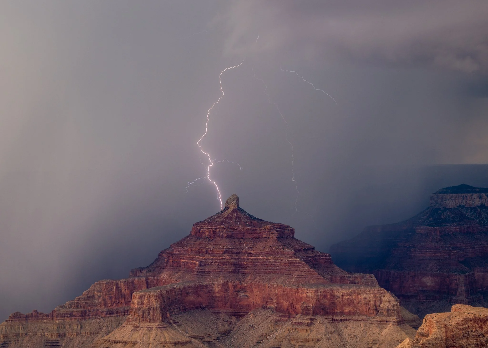 More Grand Canyon bolts.
Isis Temple. These were 4 minutes apart. 12:58 - 1:02pm AZ time, August 29.
Shown in reverse order.
Some tight crops to show birds and a strike point. 

#azwx #monsoon2026 #monsoon #stormchasing #grandcanyon @girlswhochase @g