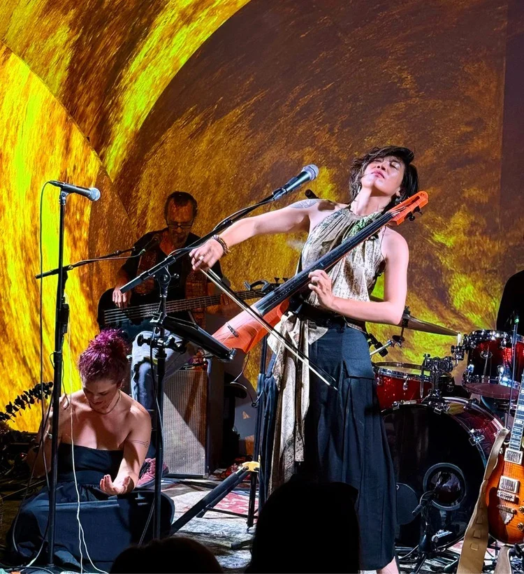 Dolce Wang performing on electric cello at Venia.