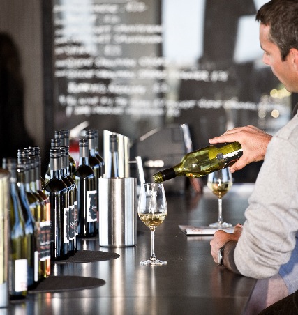 Guy pouring wine.jpg