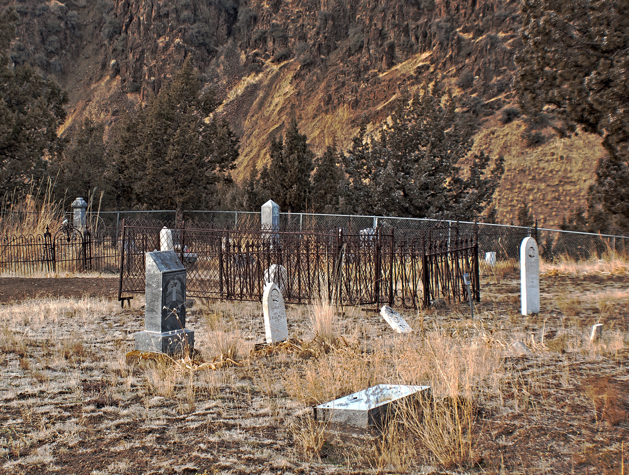 First Ironic Death of 2016: Man Jumps Off Bridge, Lands in Cemetery, Dies