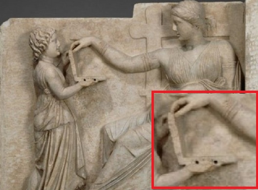 Laptop Depicted In Ancient Greek Sculpture (?)