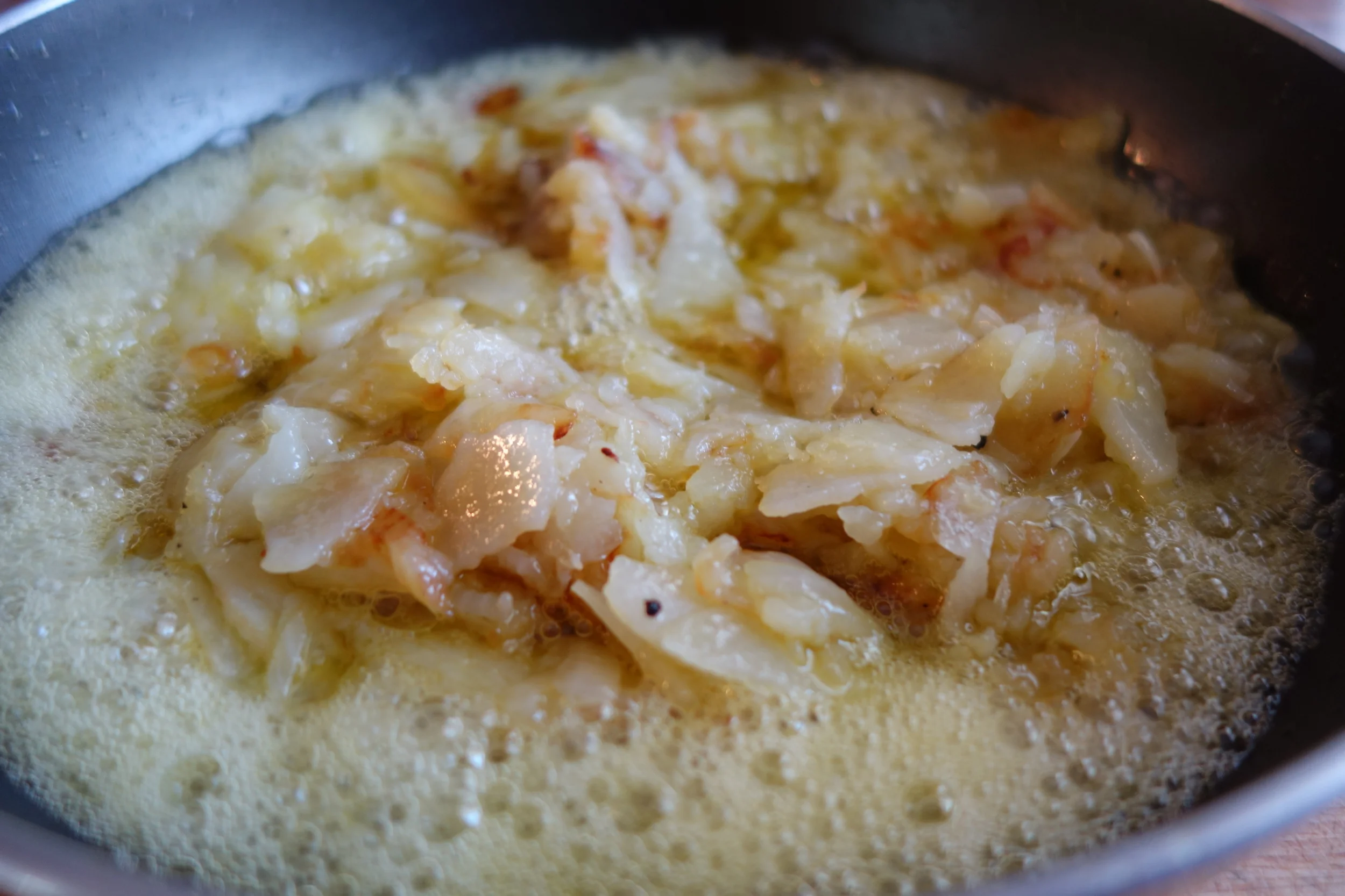 Mixture at the end of this step. Golden, crispy potatoes.