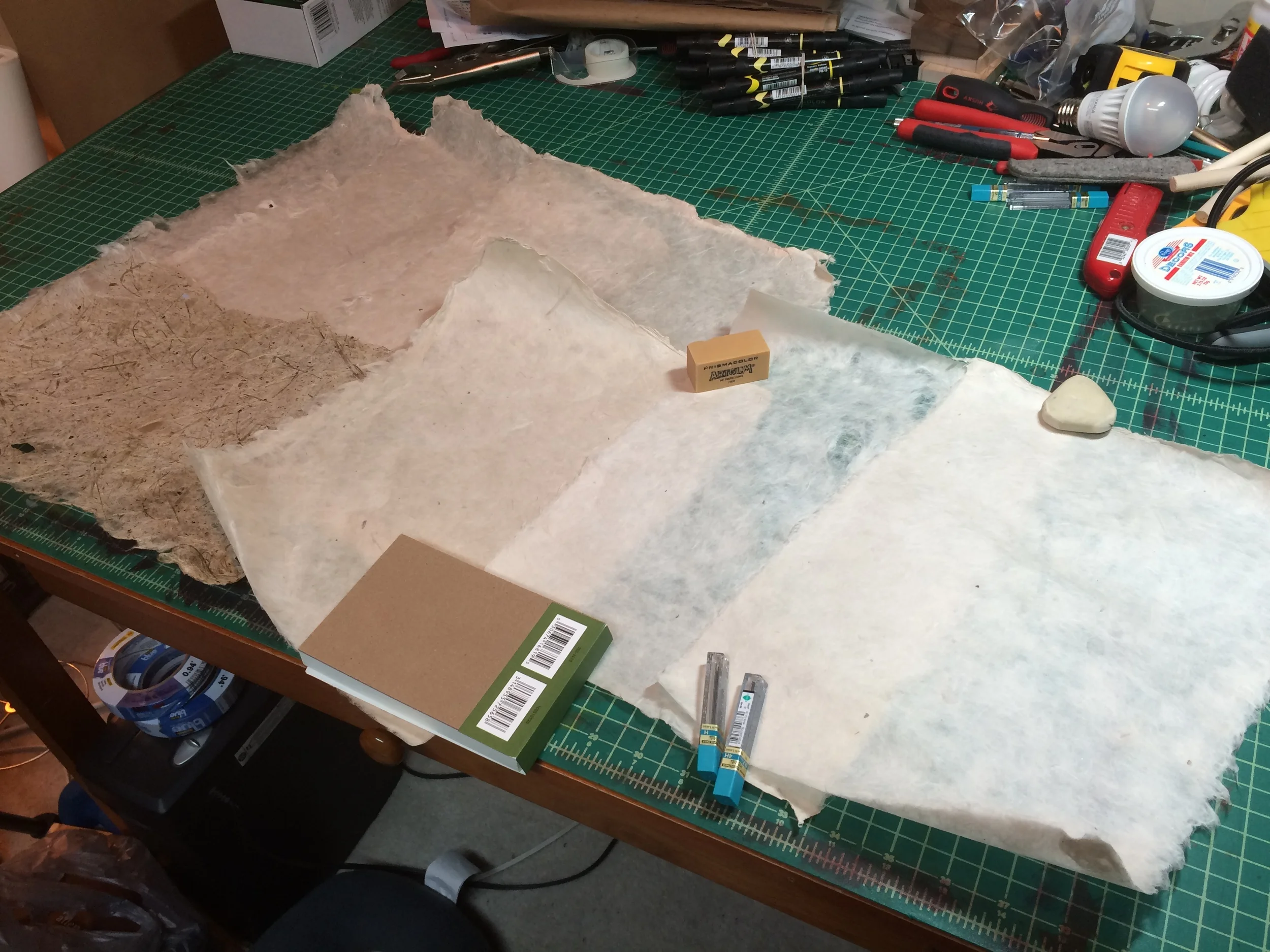 Left to Right: Three sheets of Philippine gampi, 11x17"; one sheet of wheat grass with kozo; one sheet of kozo and Japanese gampi blend, 8.5x11"; two sheets of kozo, 8.5x11".