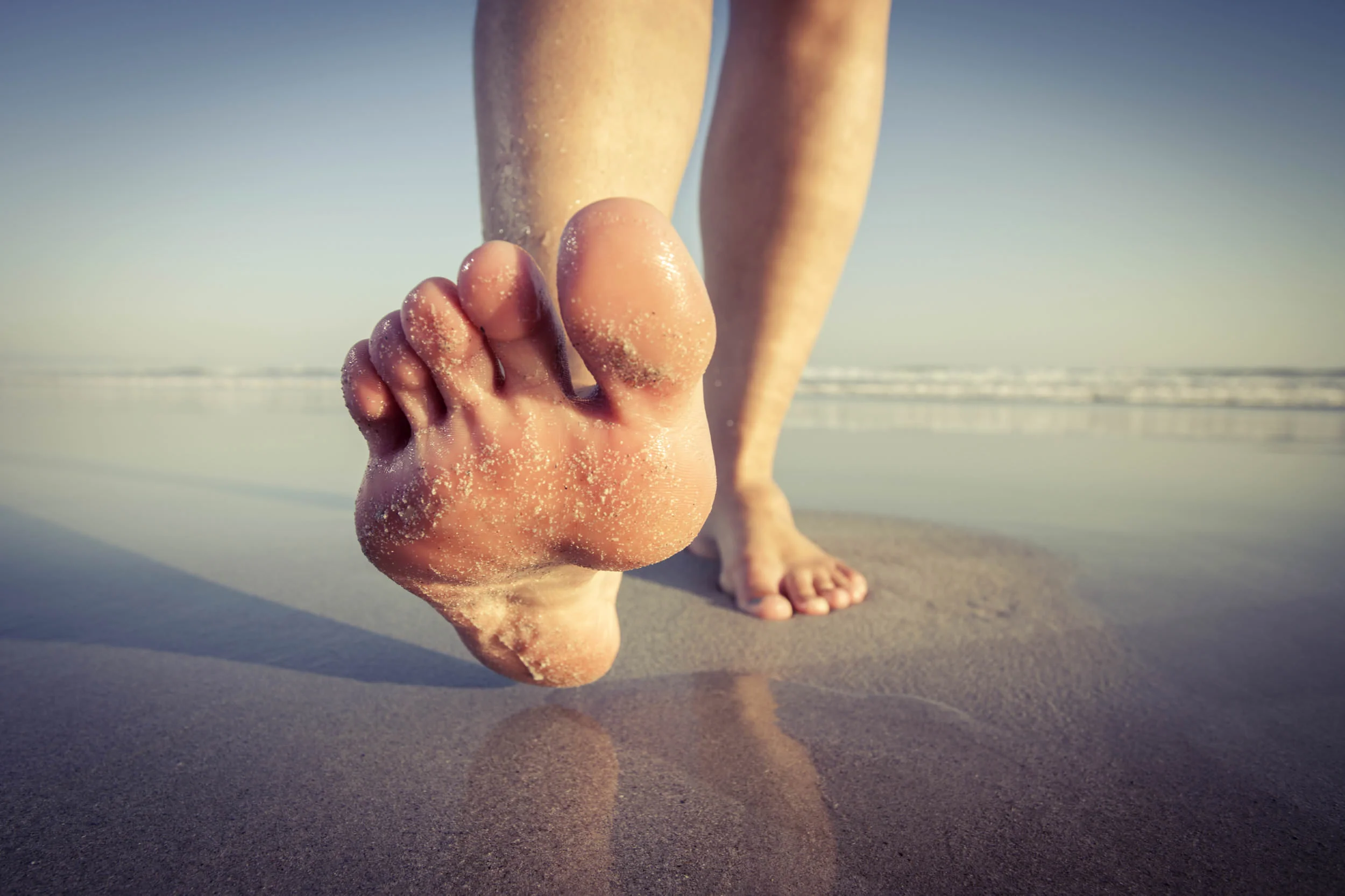 barefoot walking on the beach.jpg