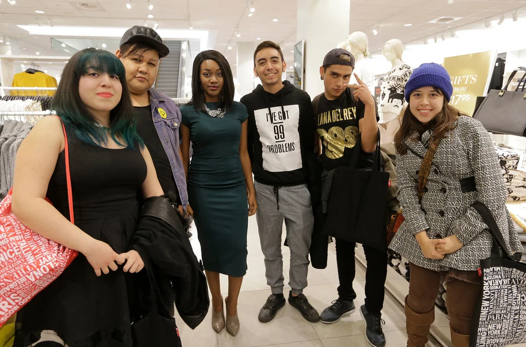 Jaleesa Charisse (formerly The Fashion Geek) with Twitter winners at the H&M opening event at Cielo Vista mall in El Paso, Texas on December 18, 2014.