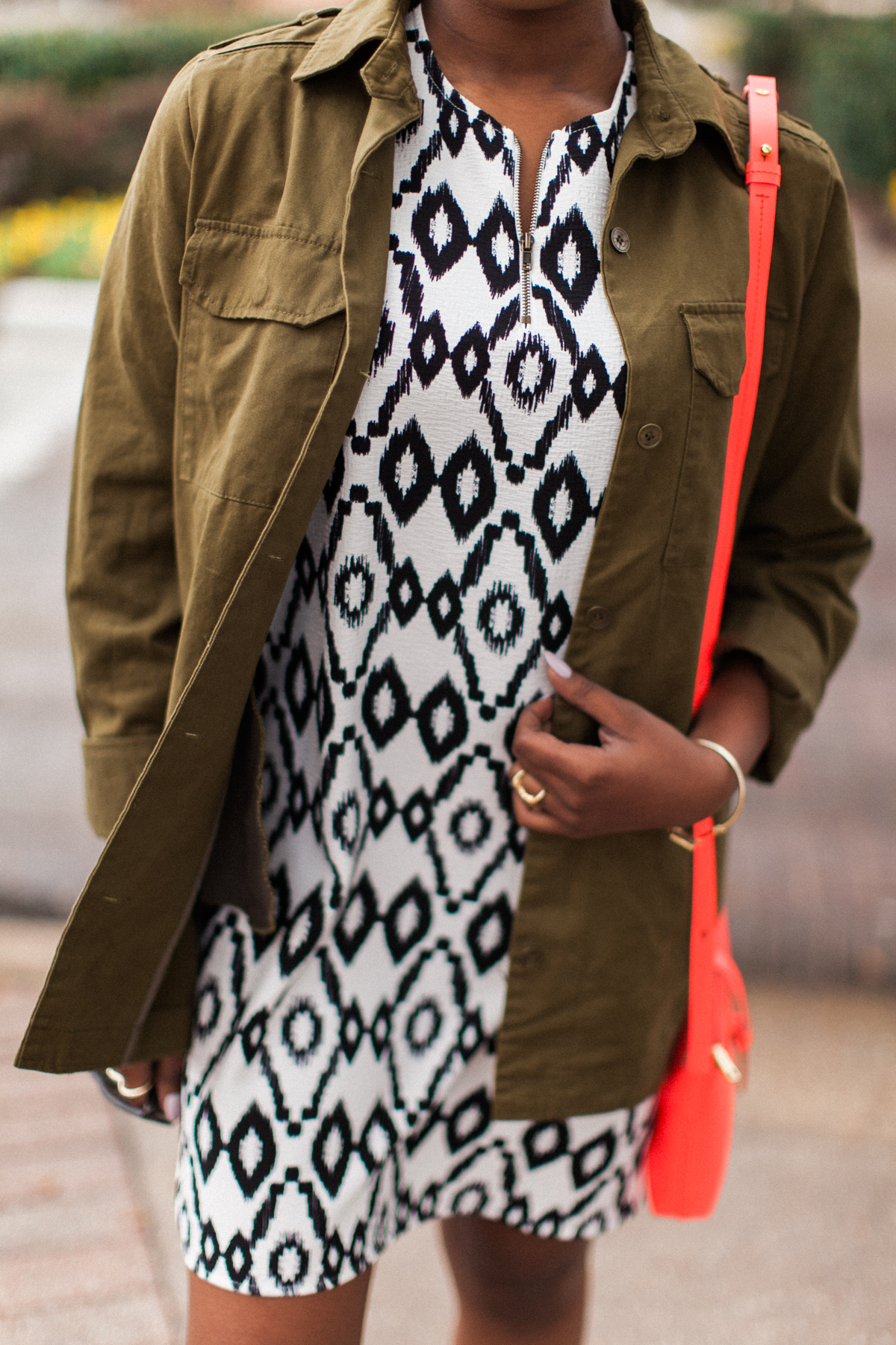 I have a closet full of clothes, but I didn't have a tribal print shift dress ( similar silhouette ) and it was on sale -- score! You can go edgy or bohemian (or both) with a piece like this.