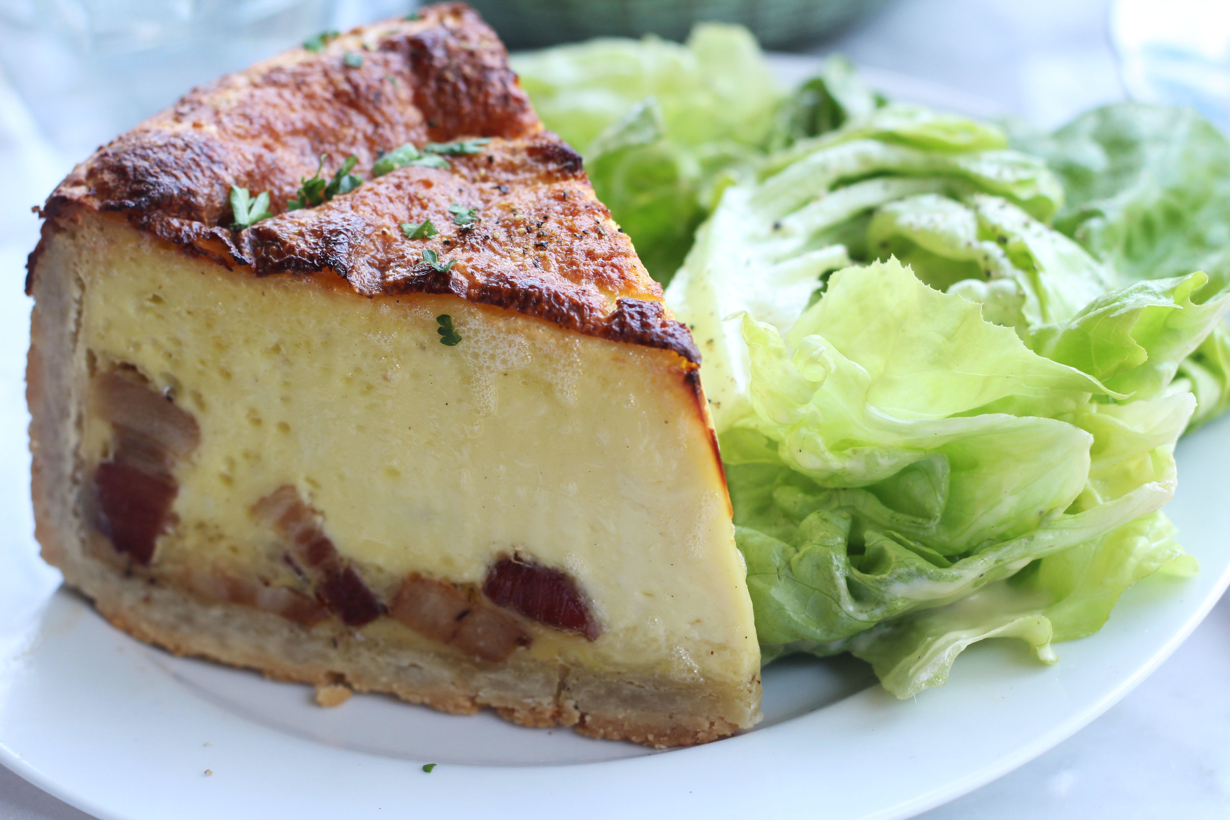 Quiche Lorraine served with salad at Mercat Bistro on Harwood in Dallas.