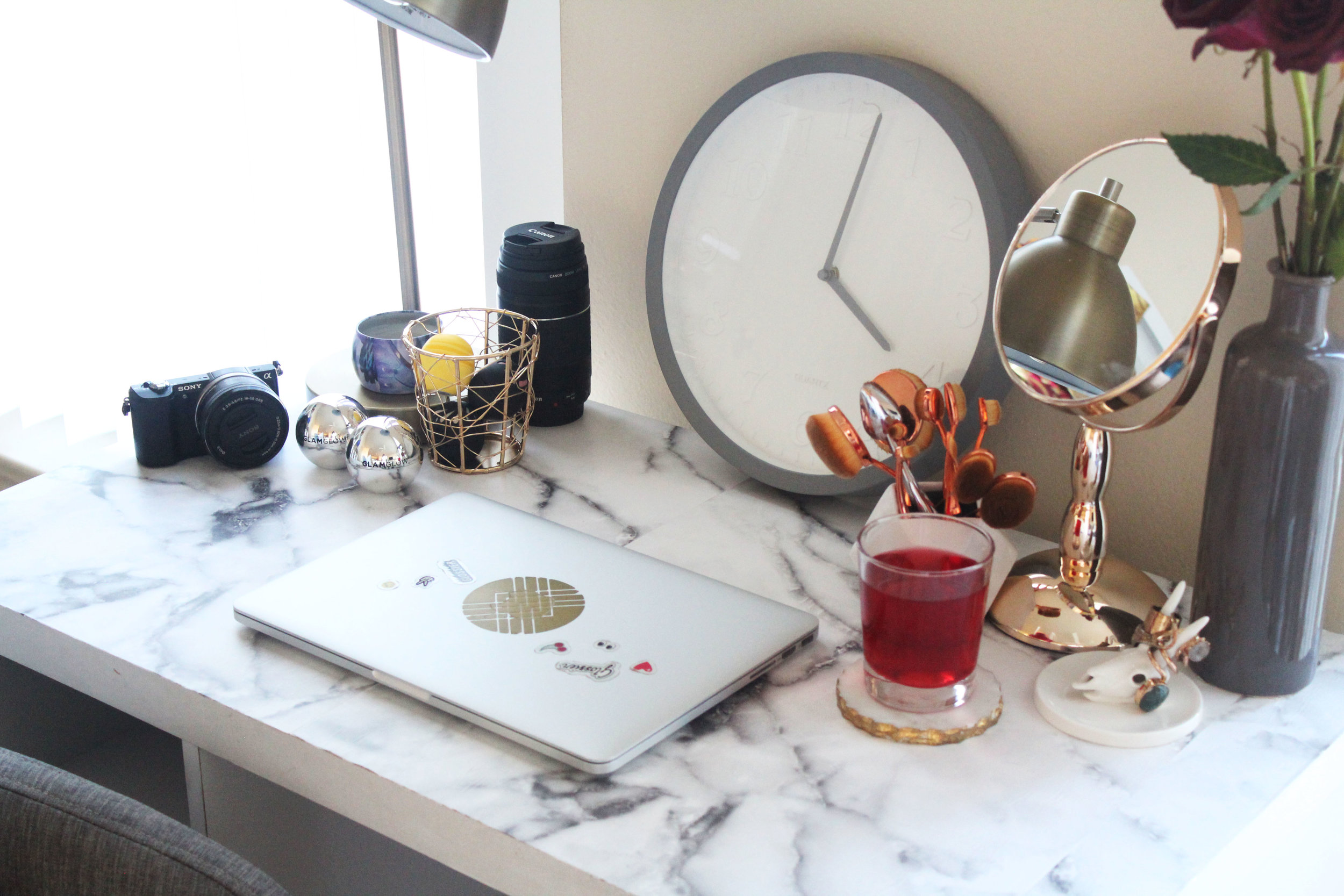 Rose gold table mirror ($14.99) // Clock ($14.99)