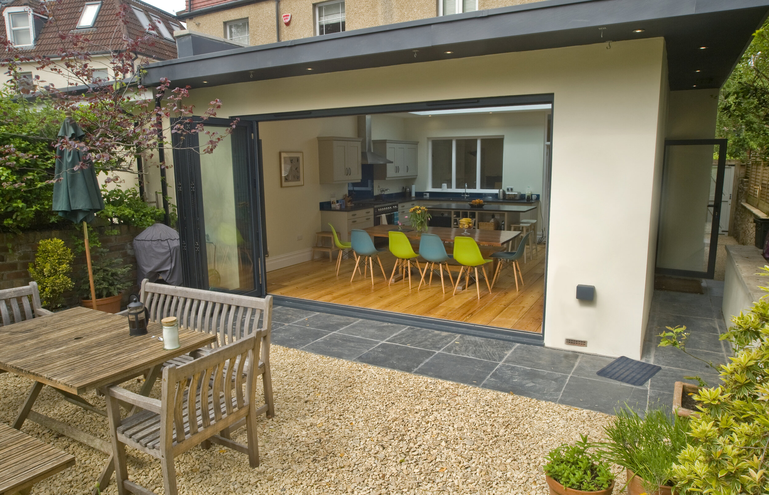 A modern extension with wrap around cantilevered roof 