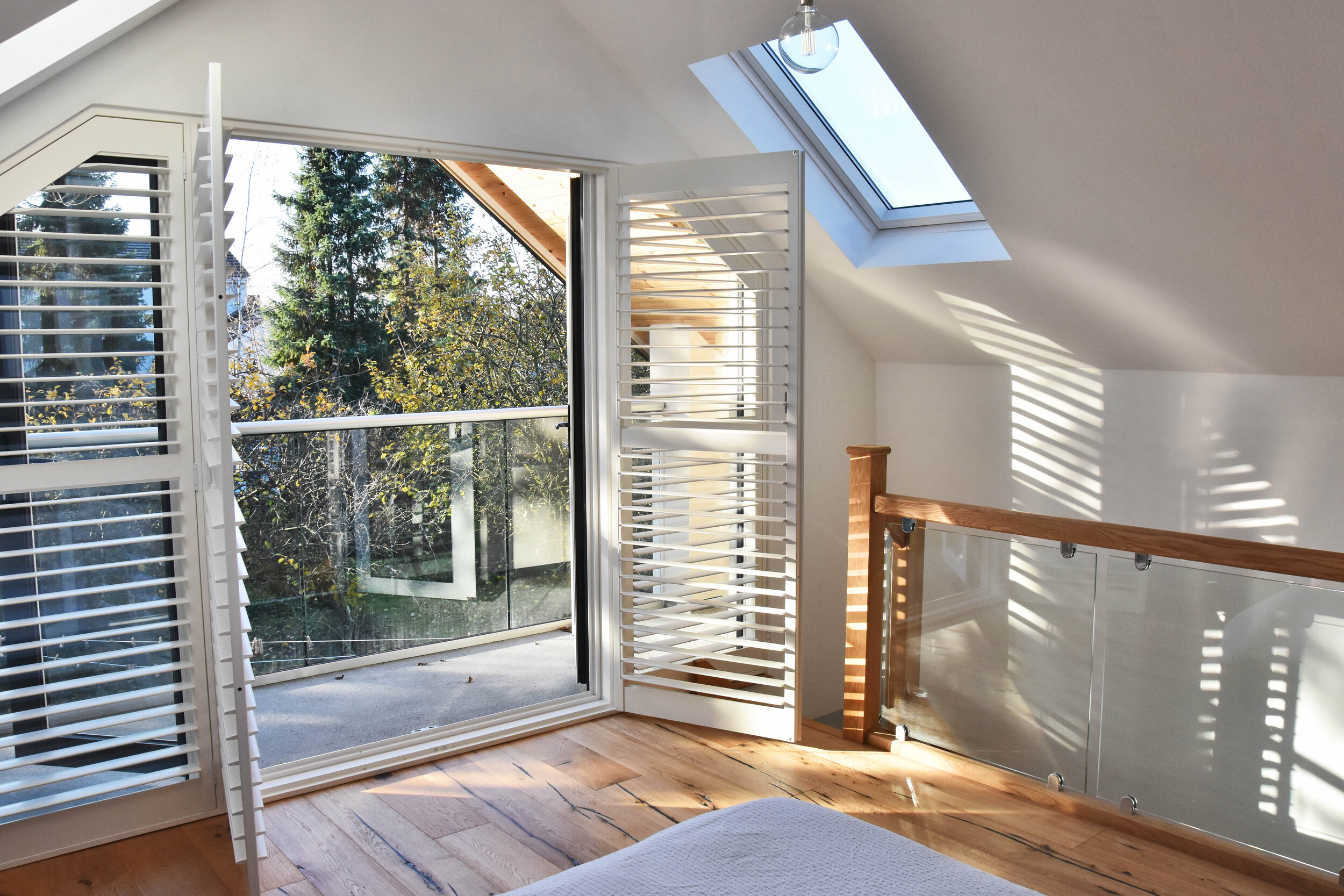 Coach house master bedroom with balcony