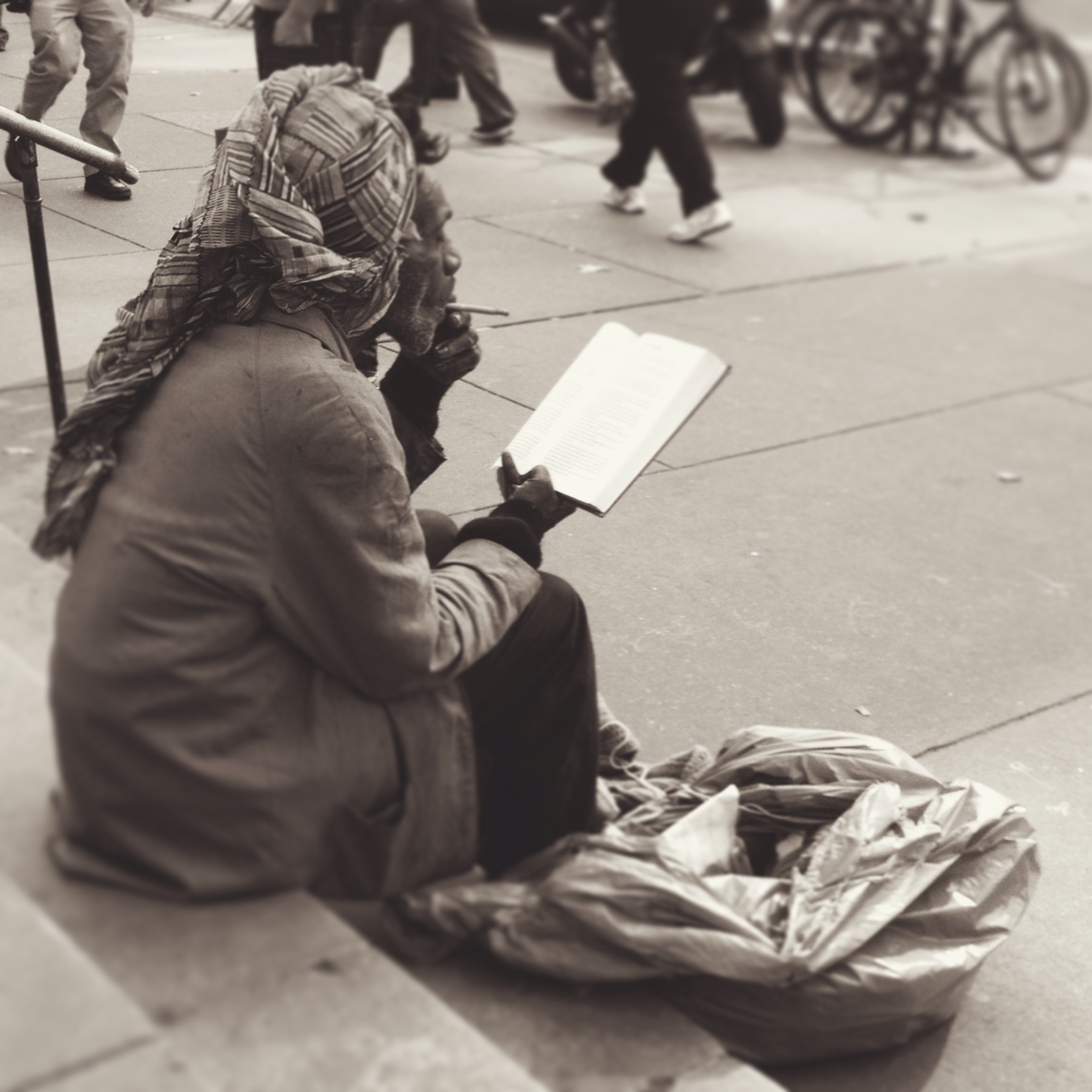 Reading on the Steps of the New York Public Library at Bryant Park