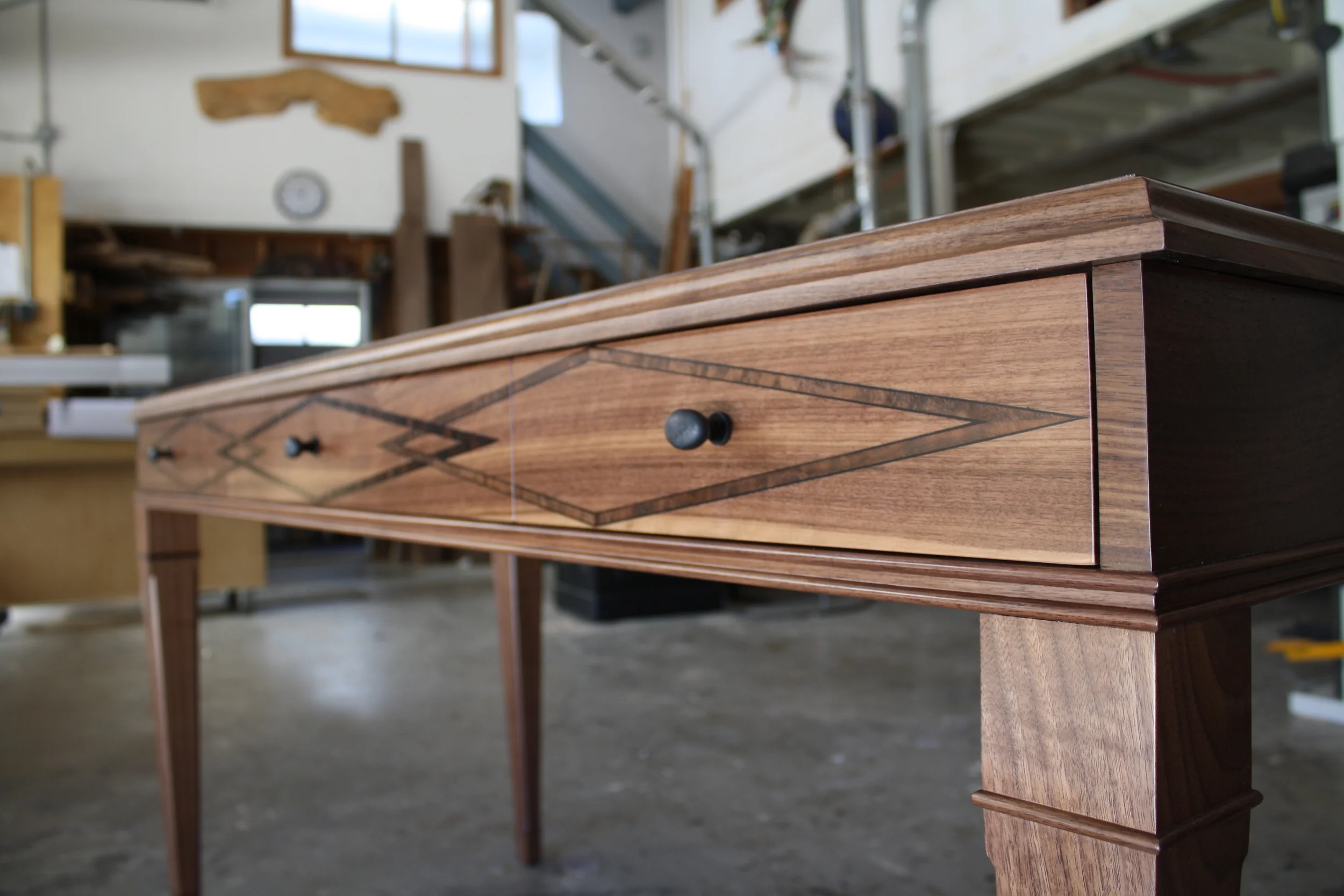 The Executive Desk - available in Walnut with Macassar Ebony and Walnut burl woven inlays.