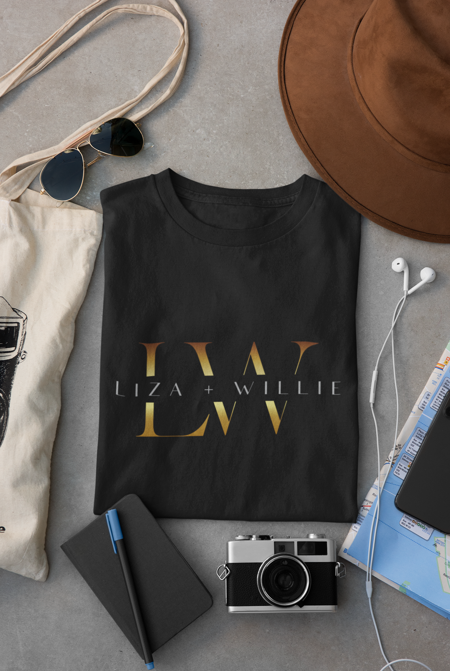 mockup-of-a-folded-t-shirt-placed-between-some-accessories-33794.png