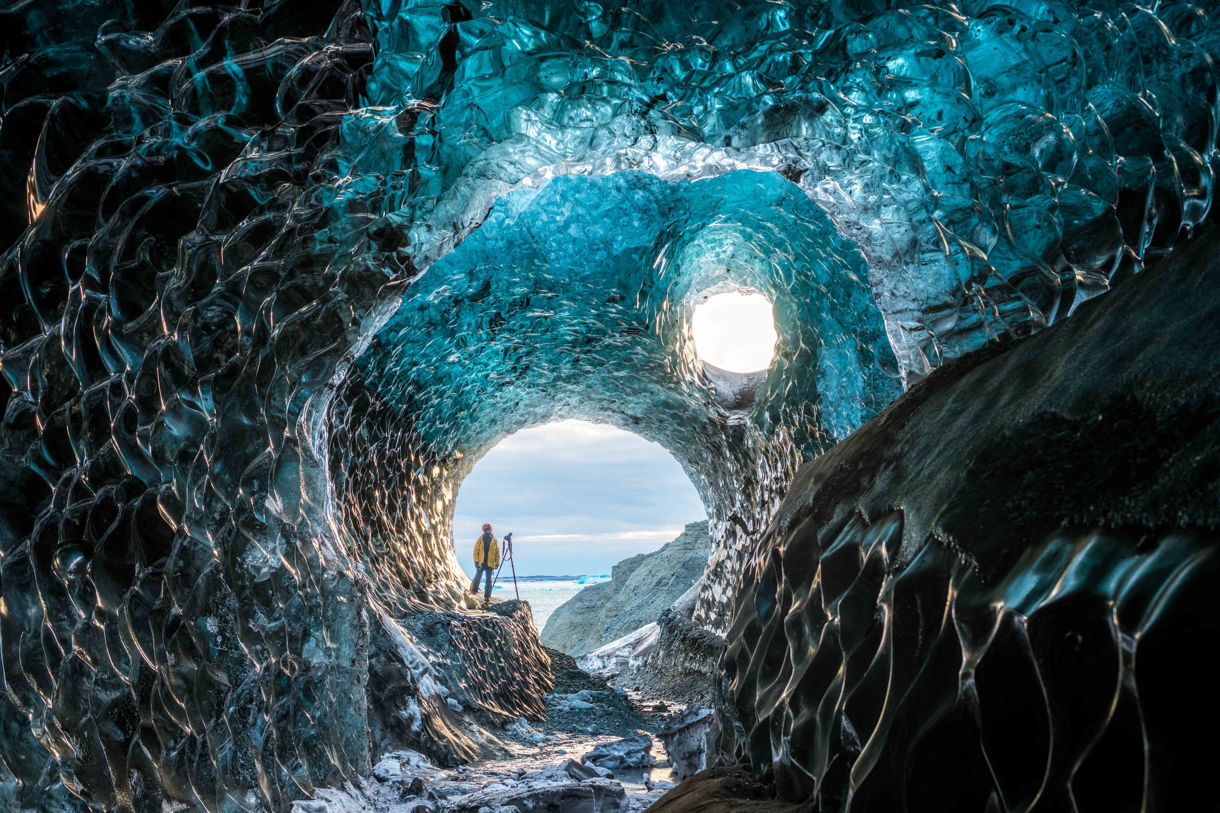 Ice Cave in Iceland Highlands and Photographer